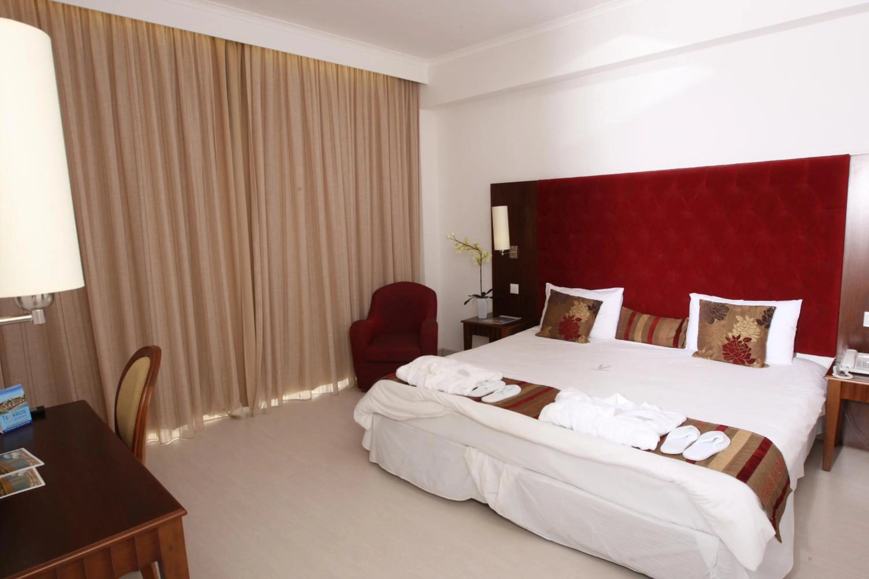 Bed in Vrissiana Boutique Beach Hotel