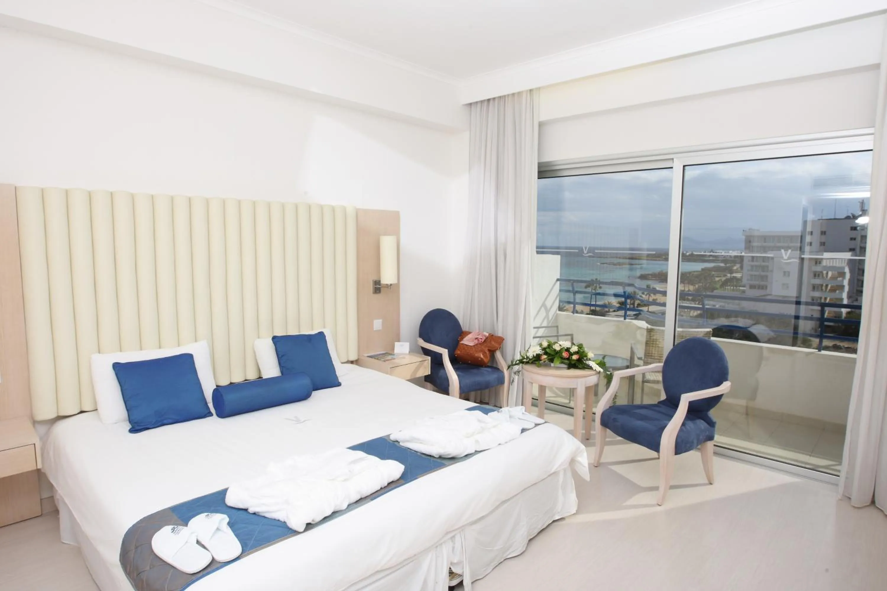 Bed in Vrissiana Boutique Beach Hotel