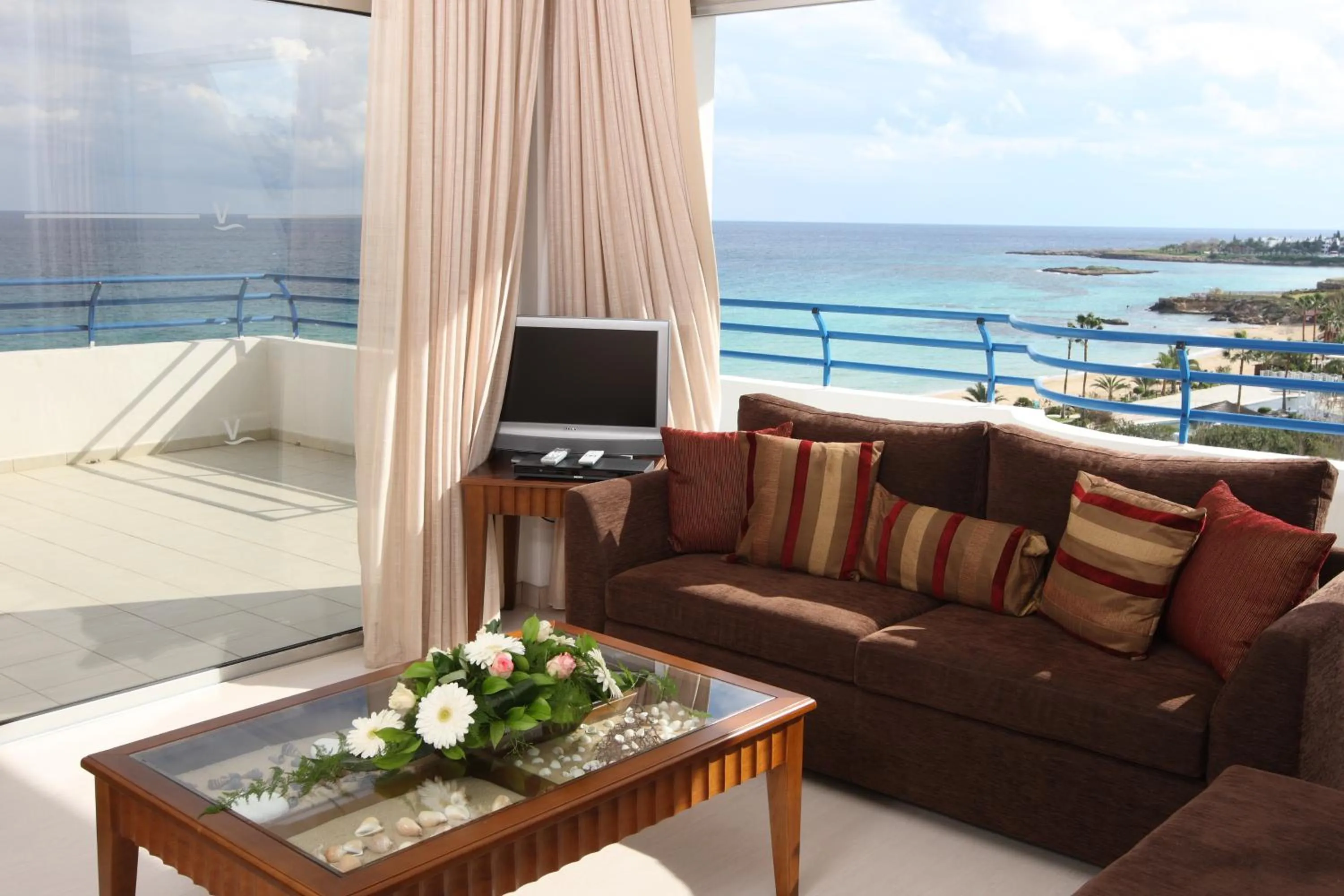 TV and multimedia in Vrissiana Boutique Beach Hotel