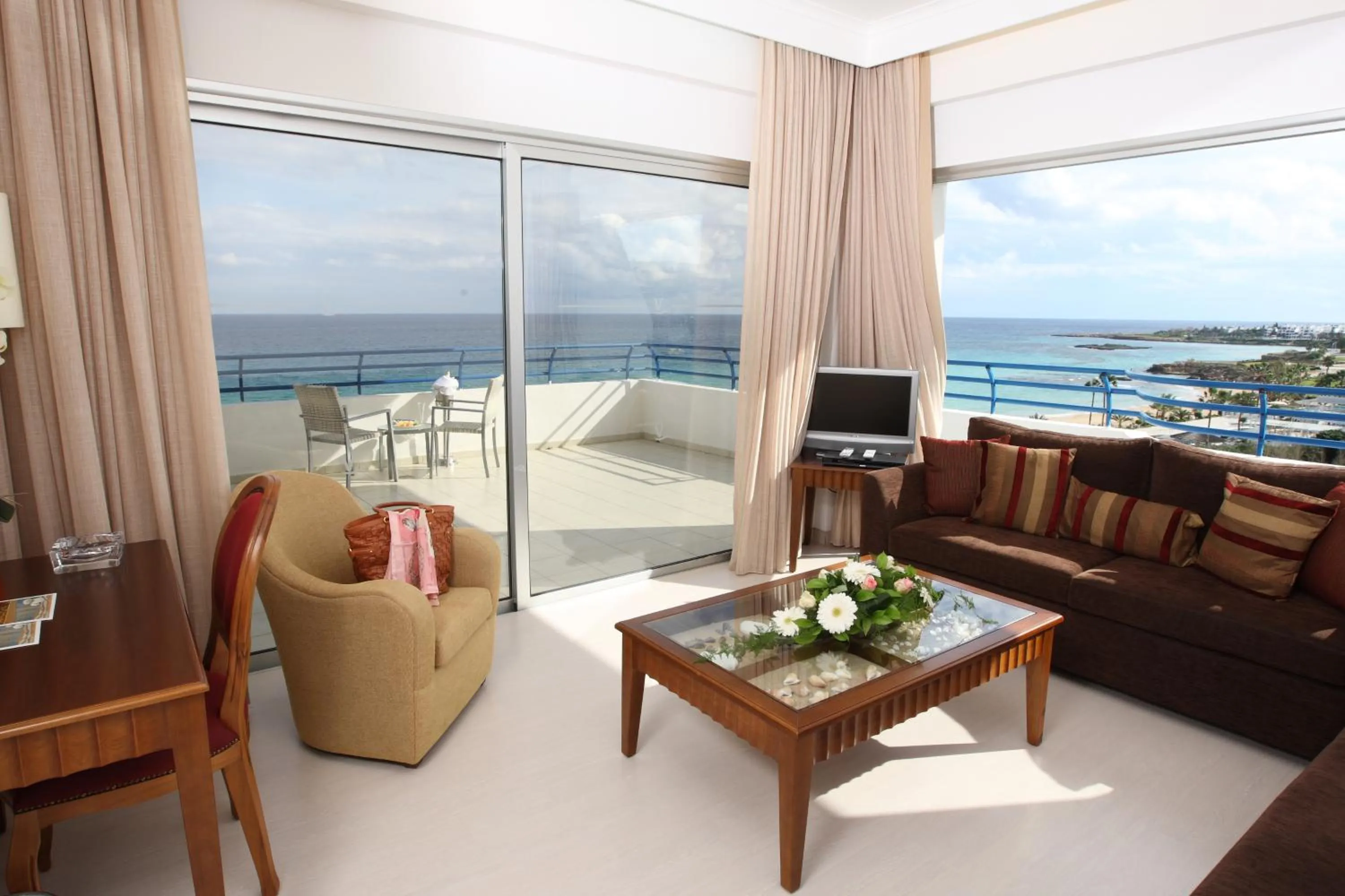 TV and multimedia in Vrissiana Boutique Beach Hotel