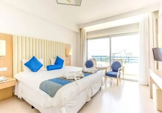 Bed in Vrissiana Boutique Beach Hotel