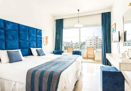 Bed in Odessa Beach Hotel