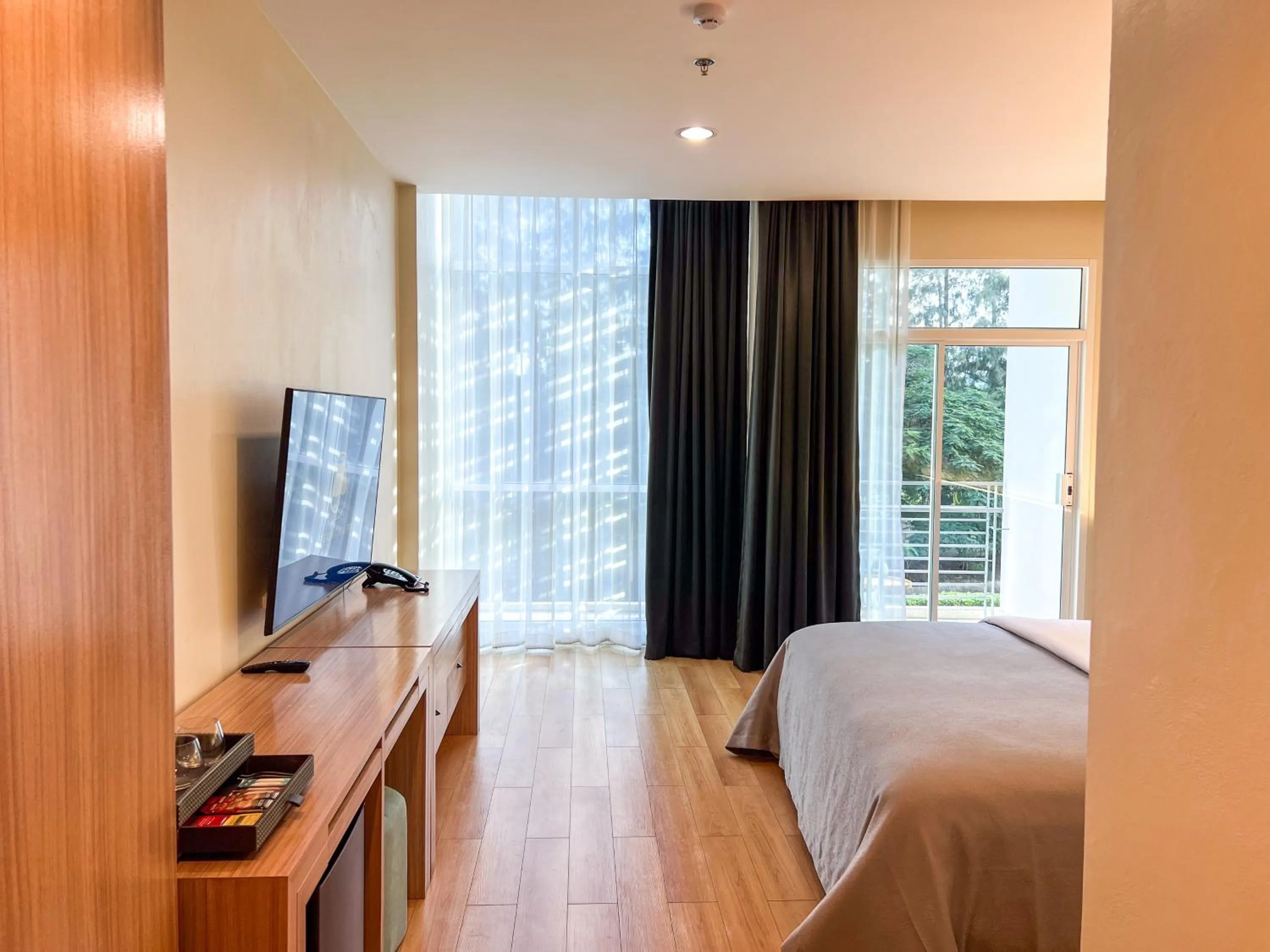 Communal lounge/ TV room, Bed in The Kaset, Hua Hin