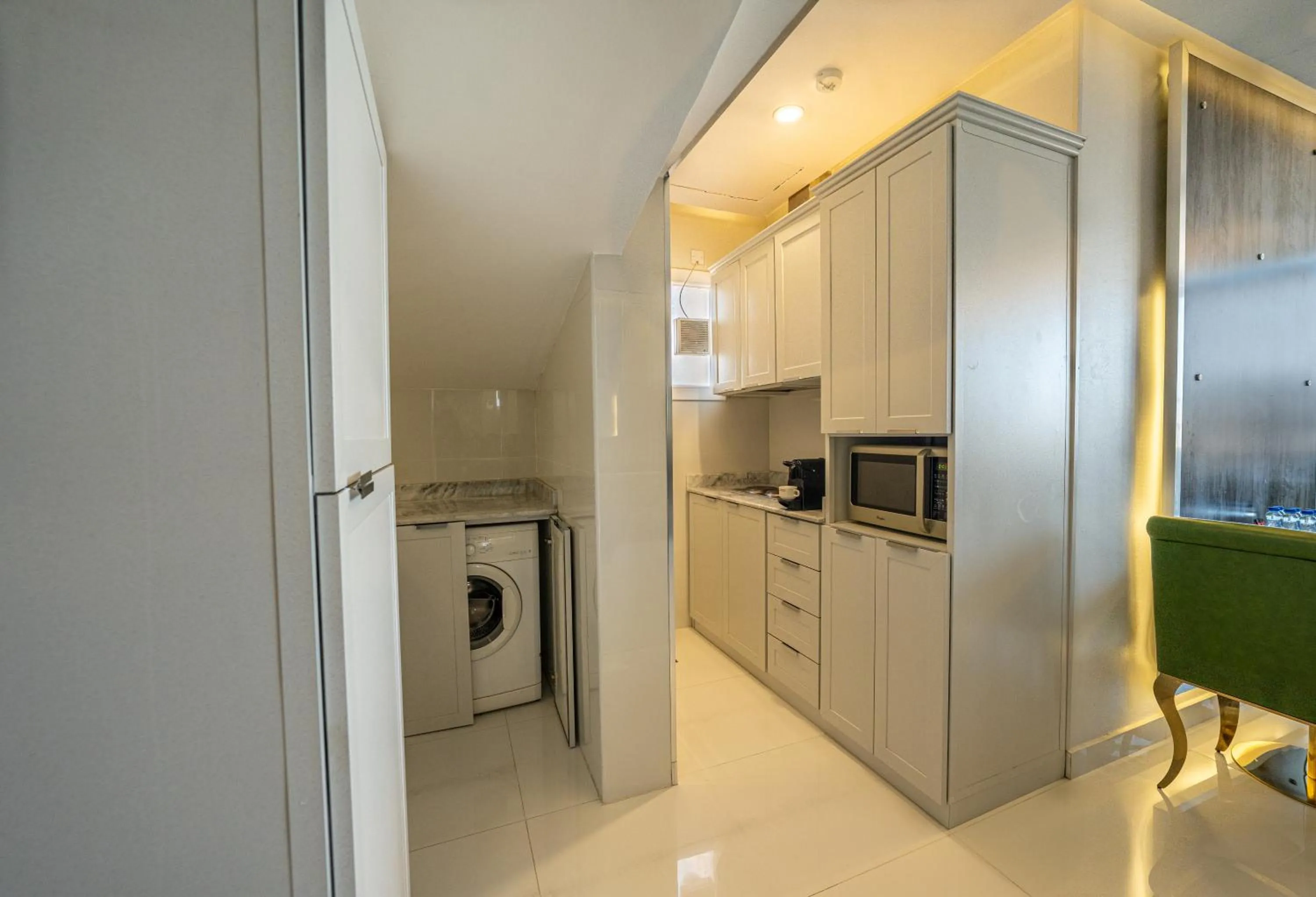 Kitchen or kitchenette in وهج للشقق الفندقية Wahaj Hotel Apartments 2