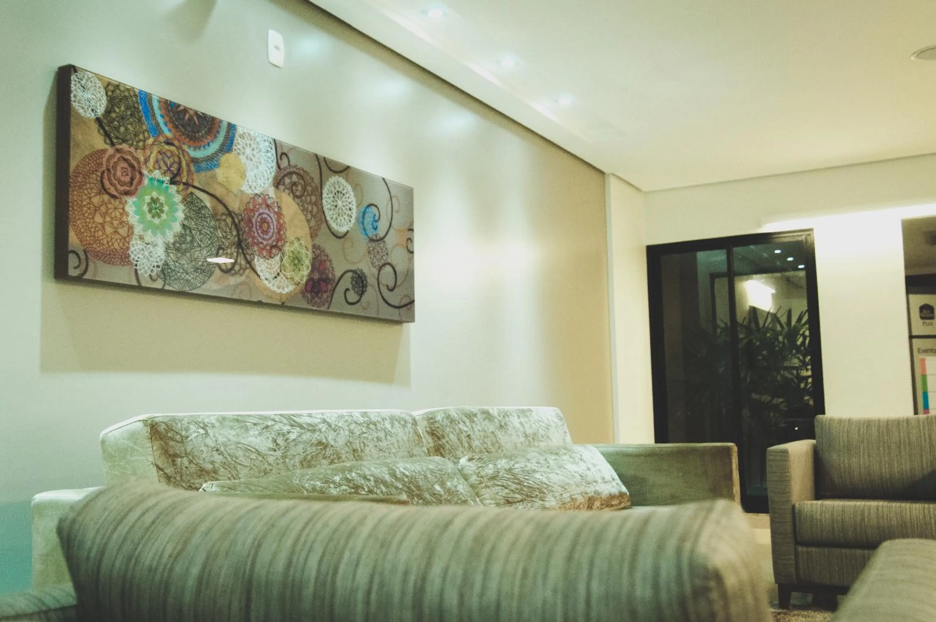 Communal lounge/ TV room in Nobile Suites Gran Lumni