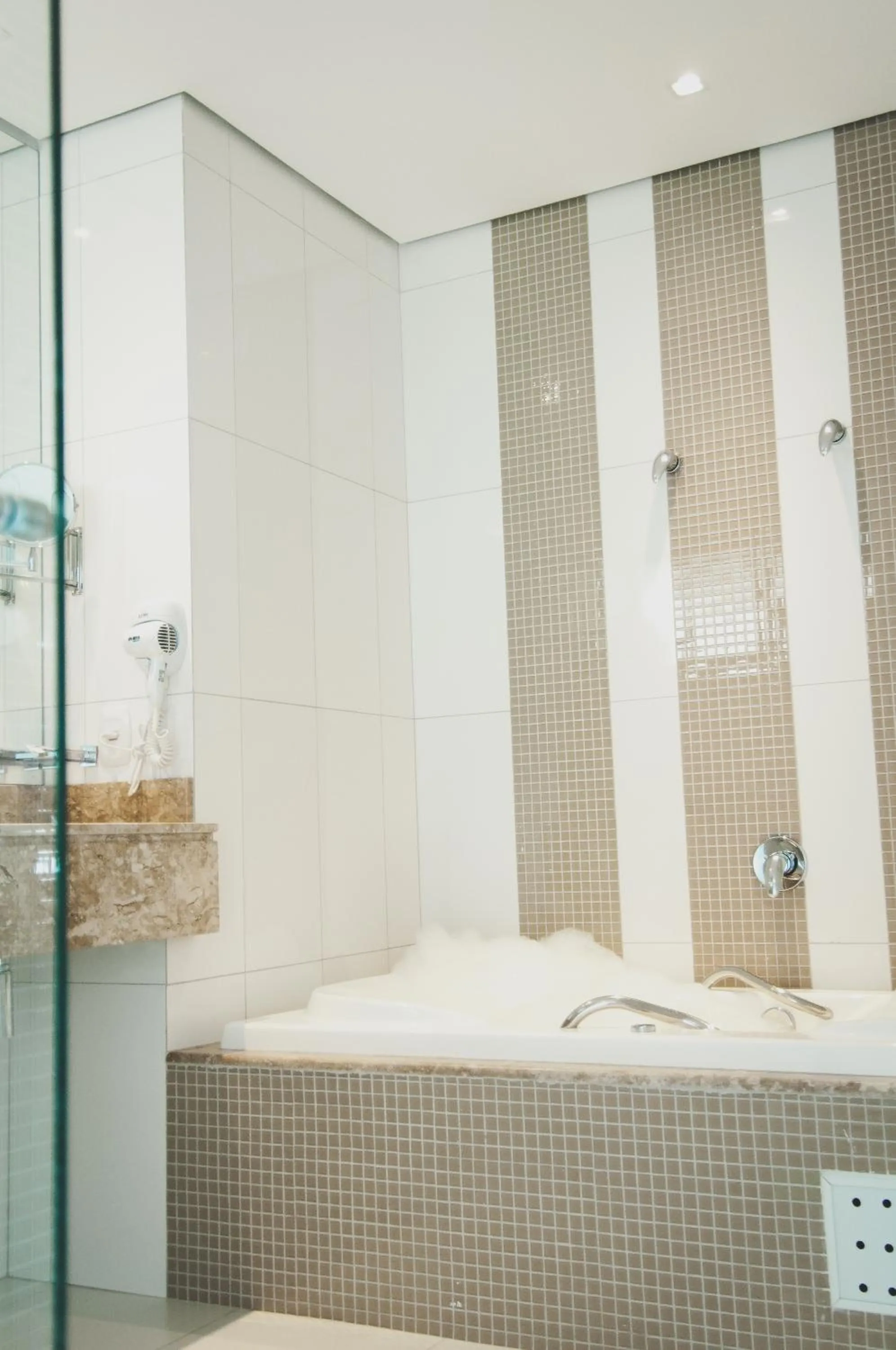 Shower in Nobile Suites Gran Lumni