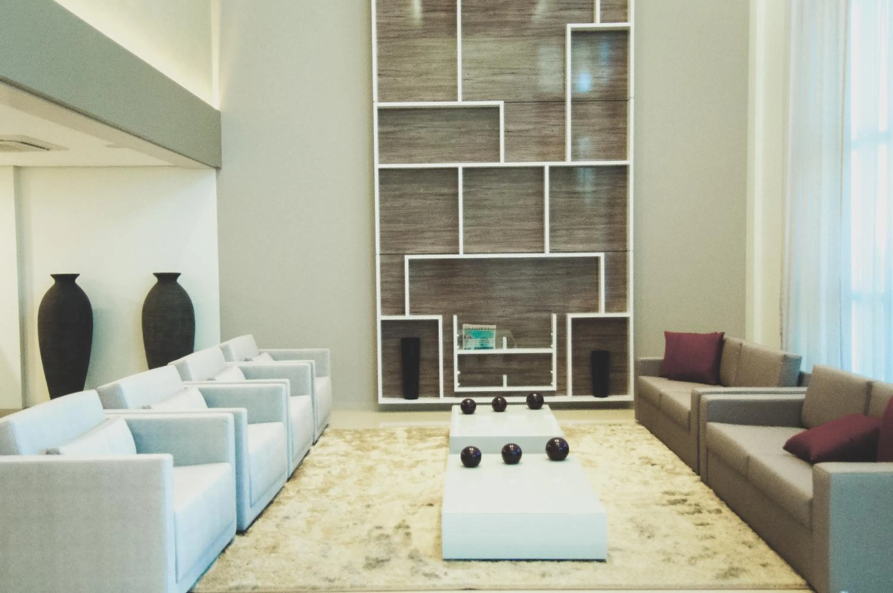 Communal lounge/ TV room in Nobile Suites Gran Lumni