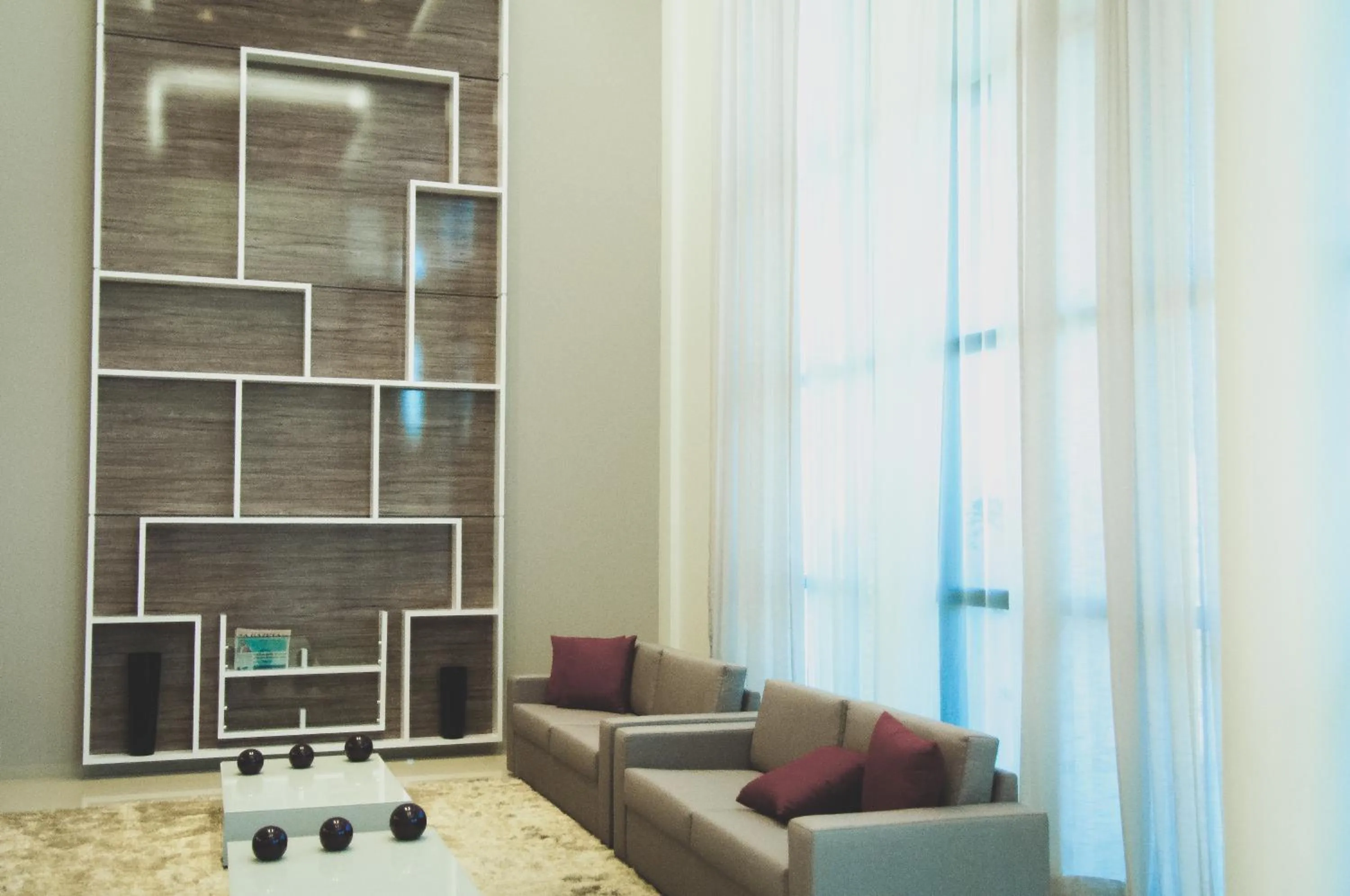 Communal lounge/ TV room in Nobile Suites Gran Lumni