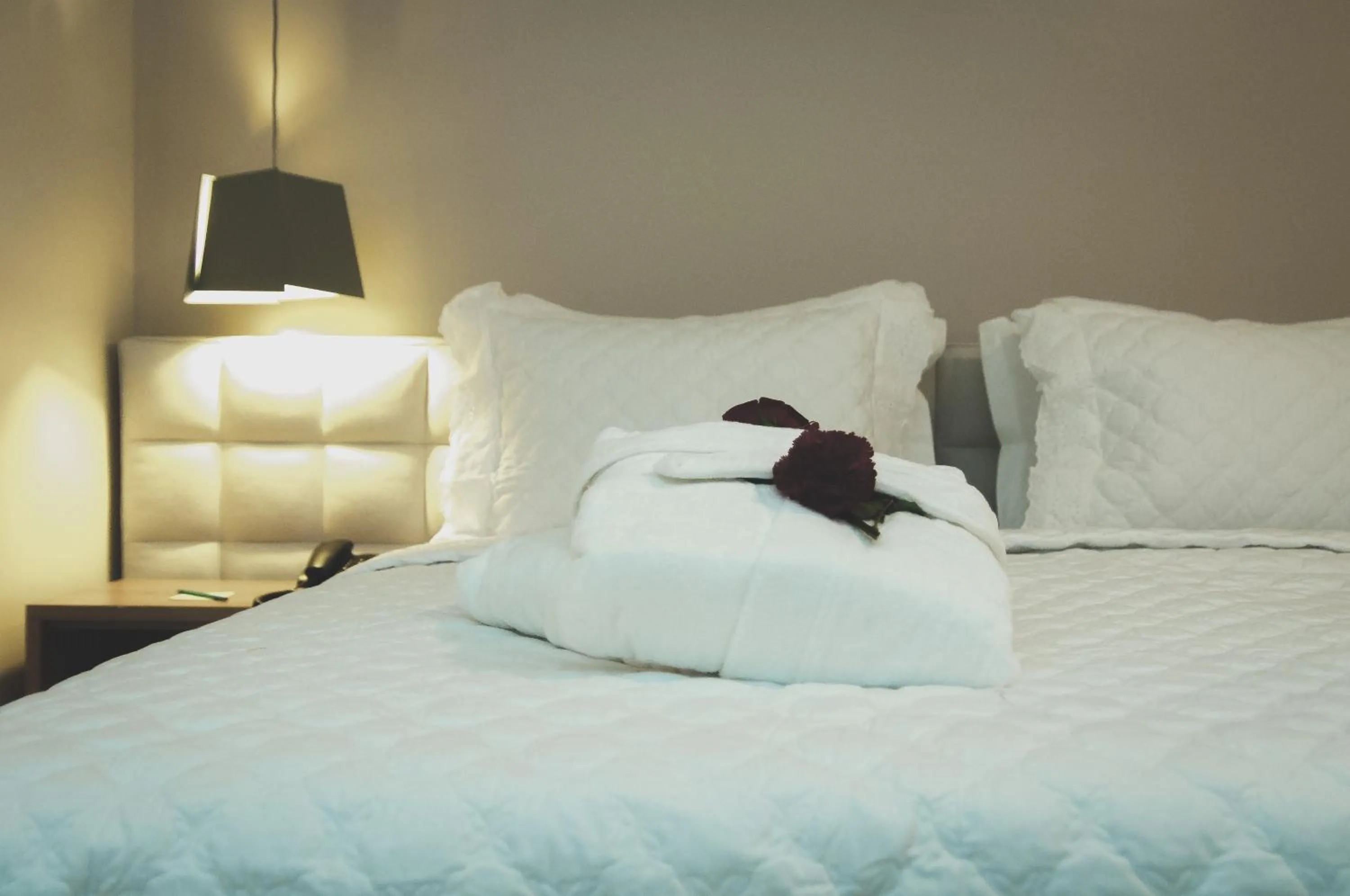 Bed in Nobile Suites Gran Lumni