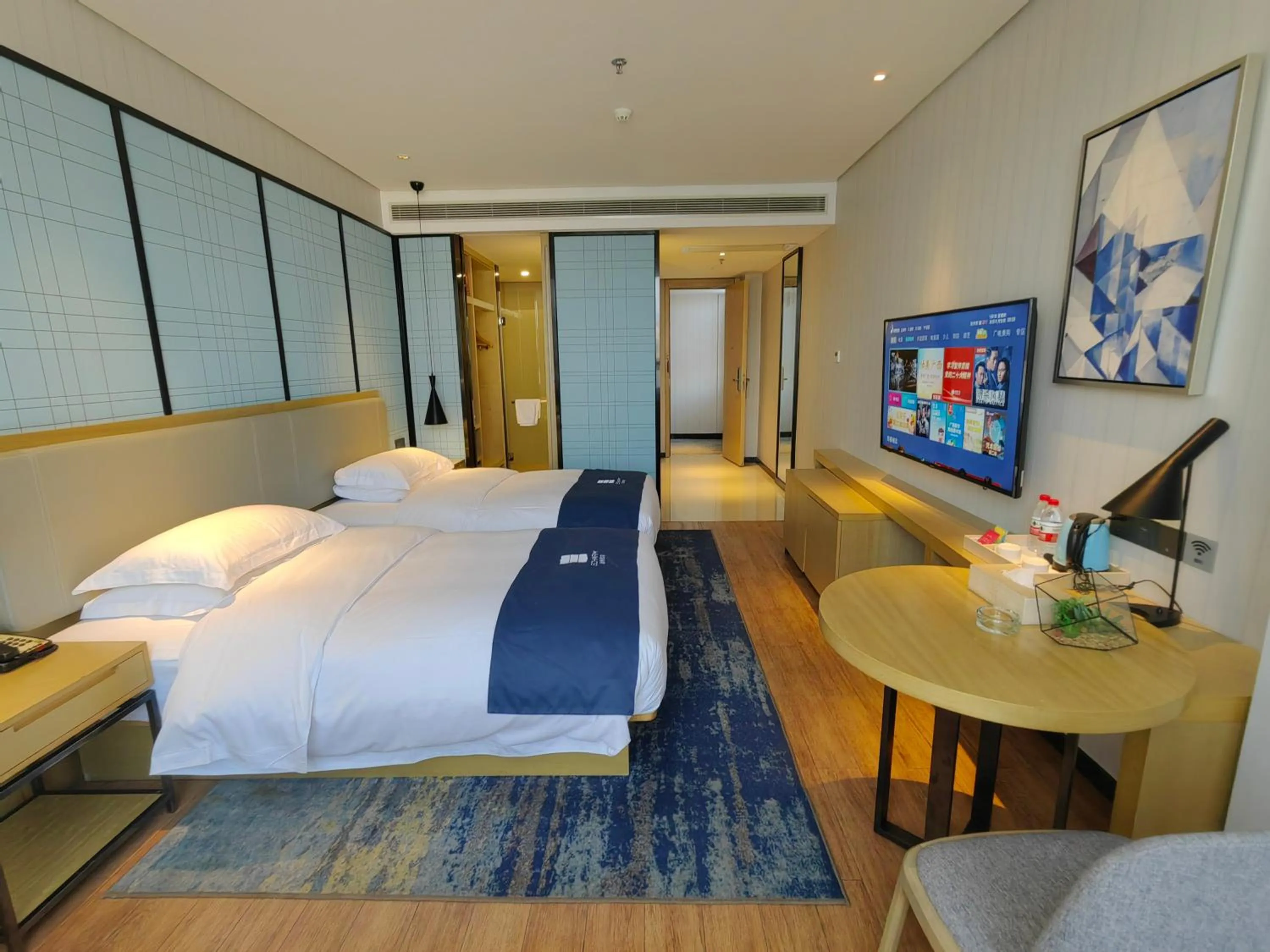 Photo of the whole room, Bed in Echarm Hotel Dongxing Minzu Road