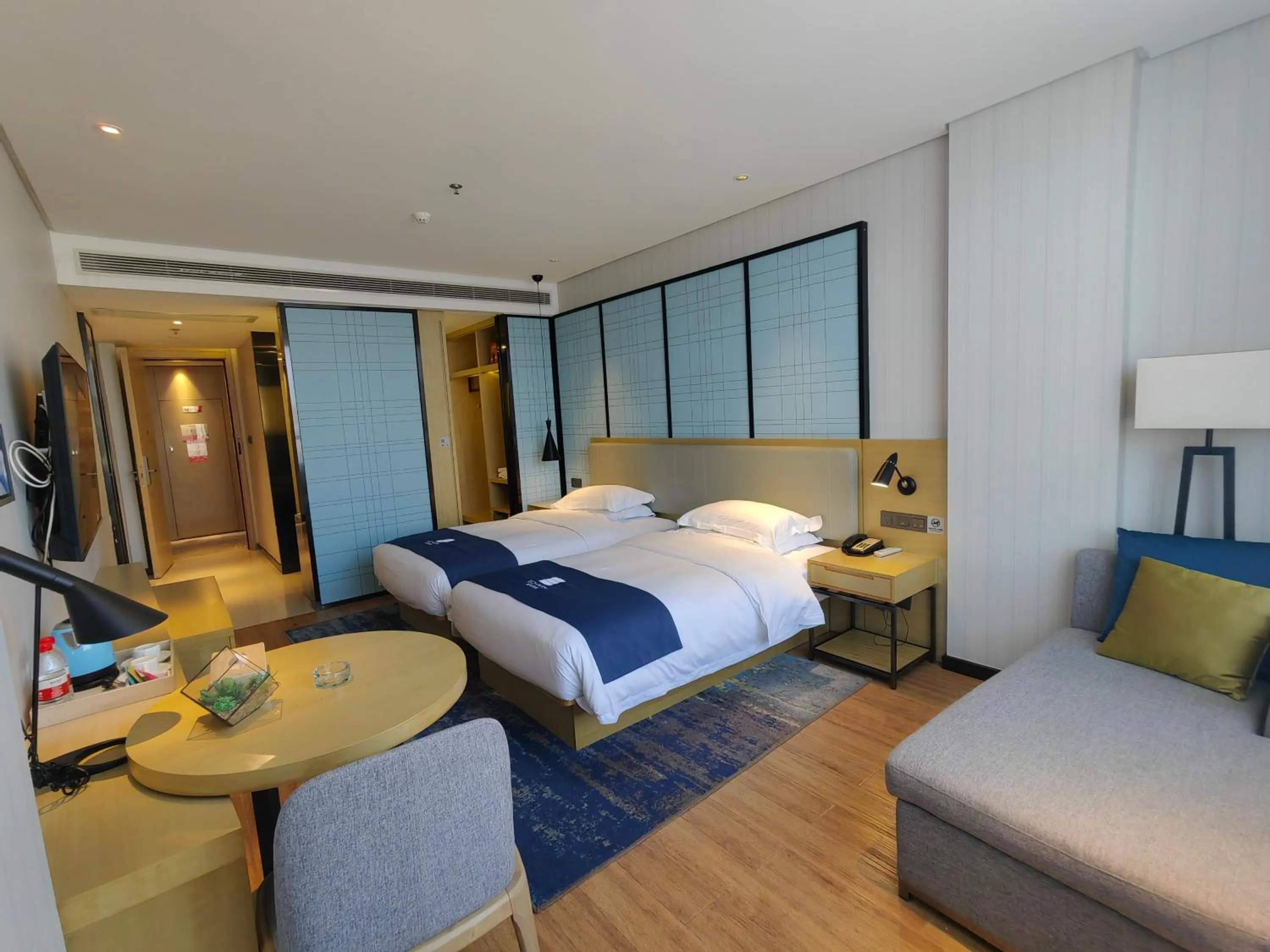 Photo of the whole room, Bed in Echarm Hotel Dongxing Minzu Road