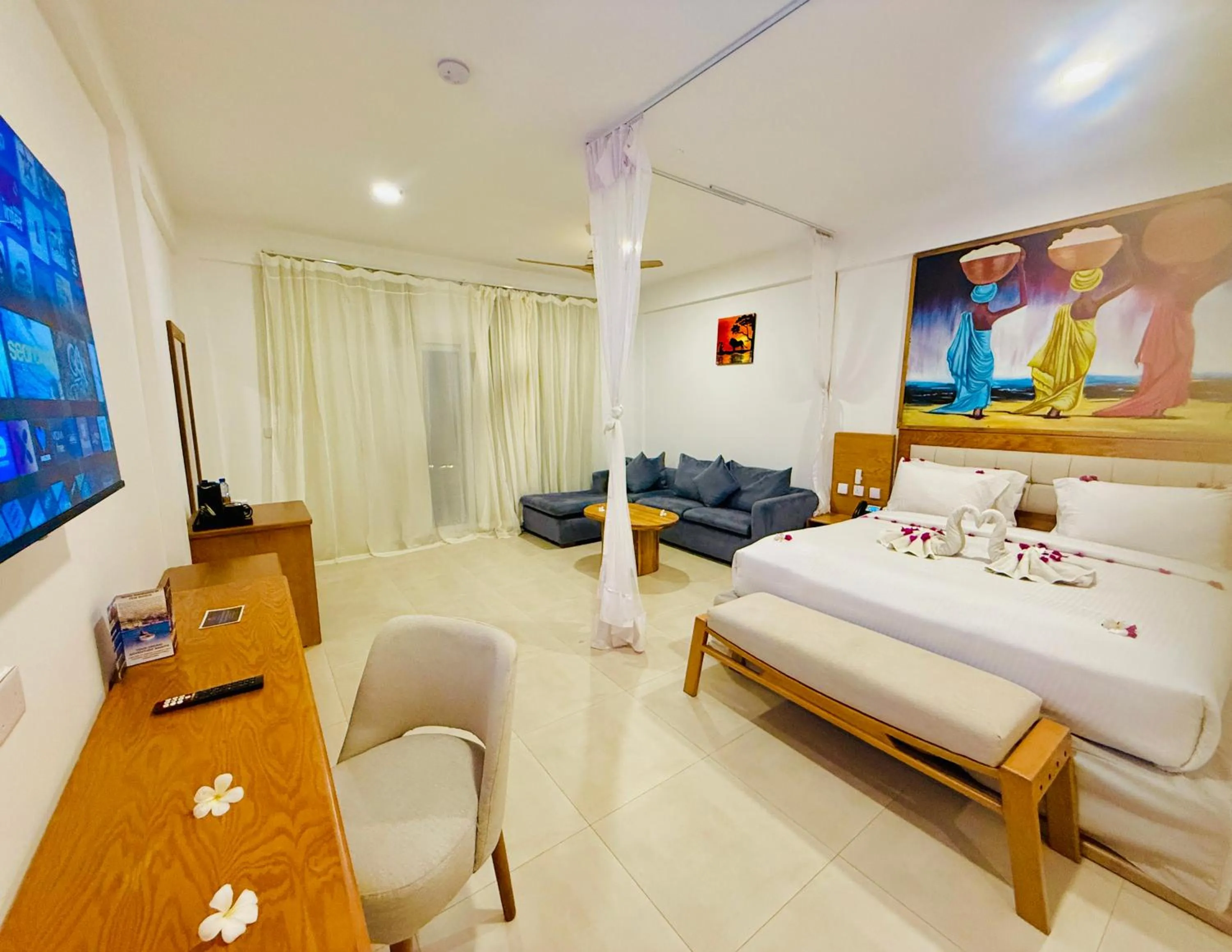 Bed in Royal Mandarin Hotel & Resort Zanzibar