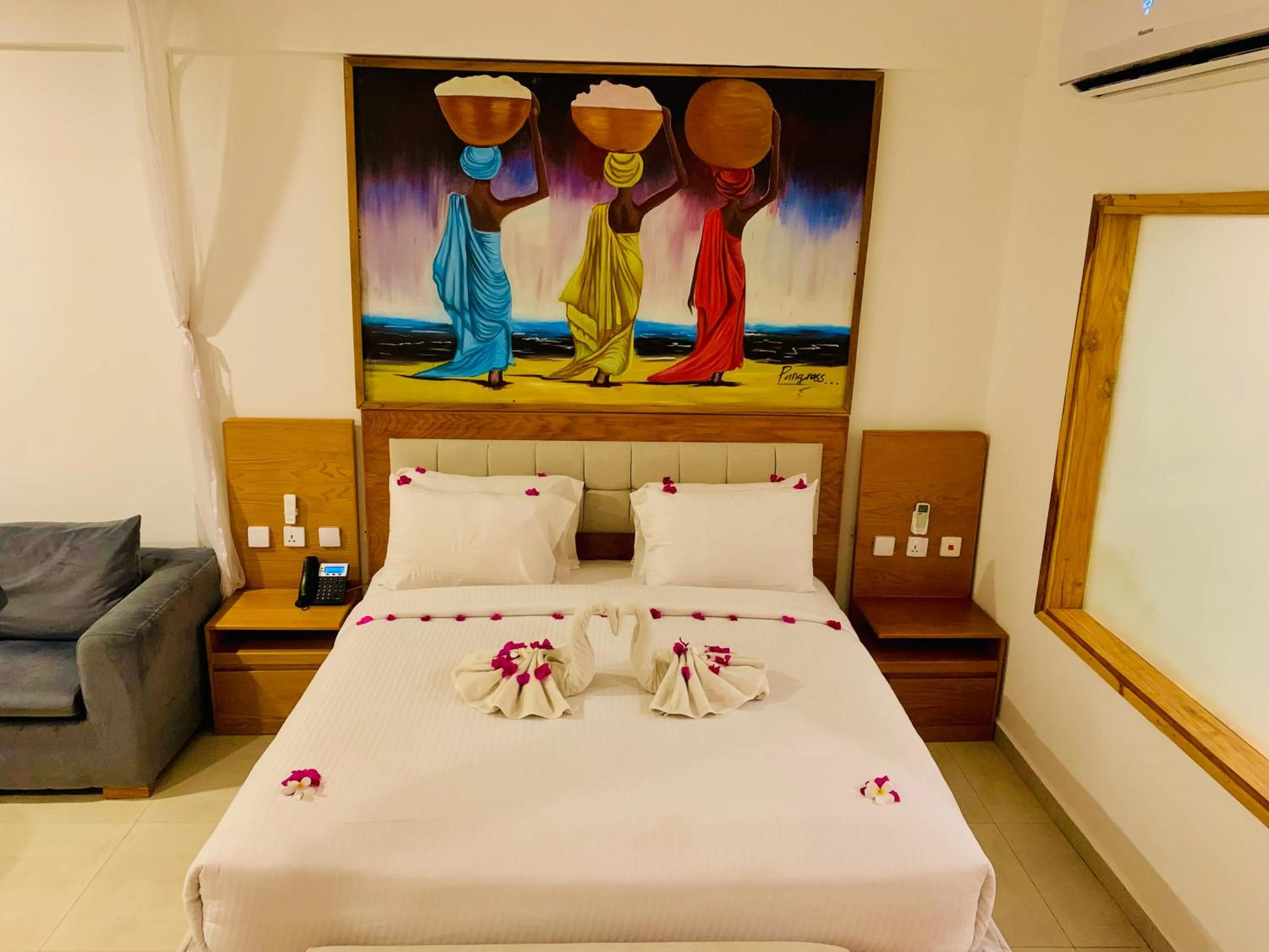 Bed in Royal Mandarin Hotel & Resort Zanzibar