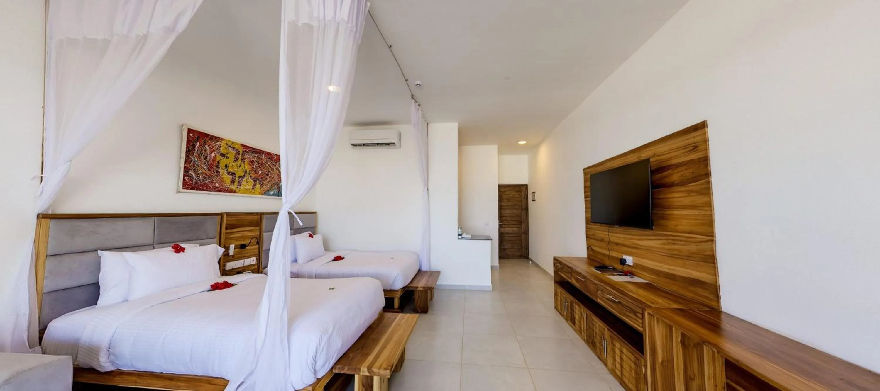 Bed in Royal Mandarin Hotel & Resort