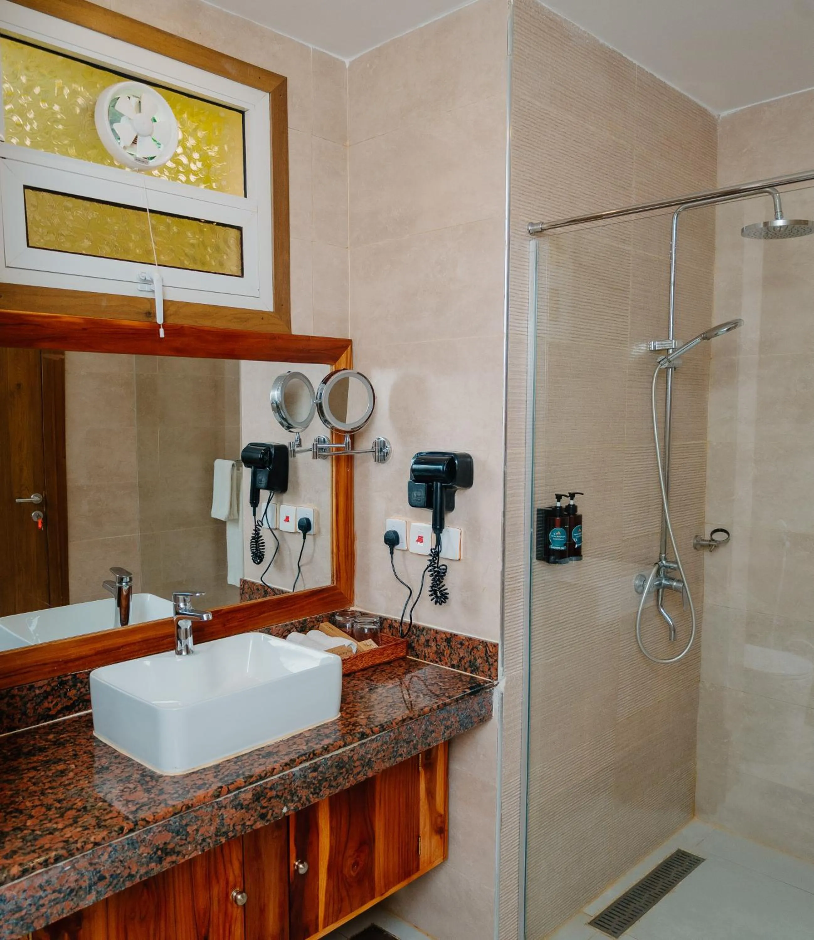 Shower in Royal Mandarin Hotel & Resort Zanzibar