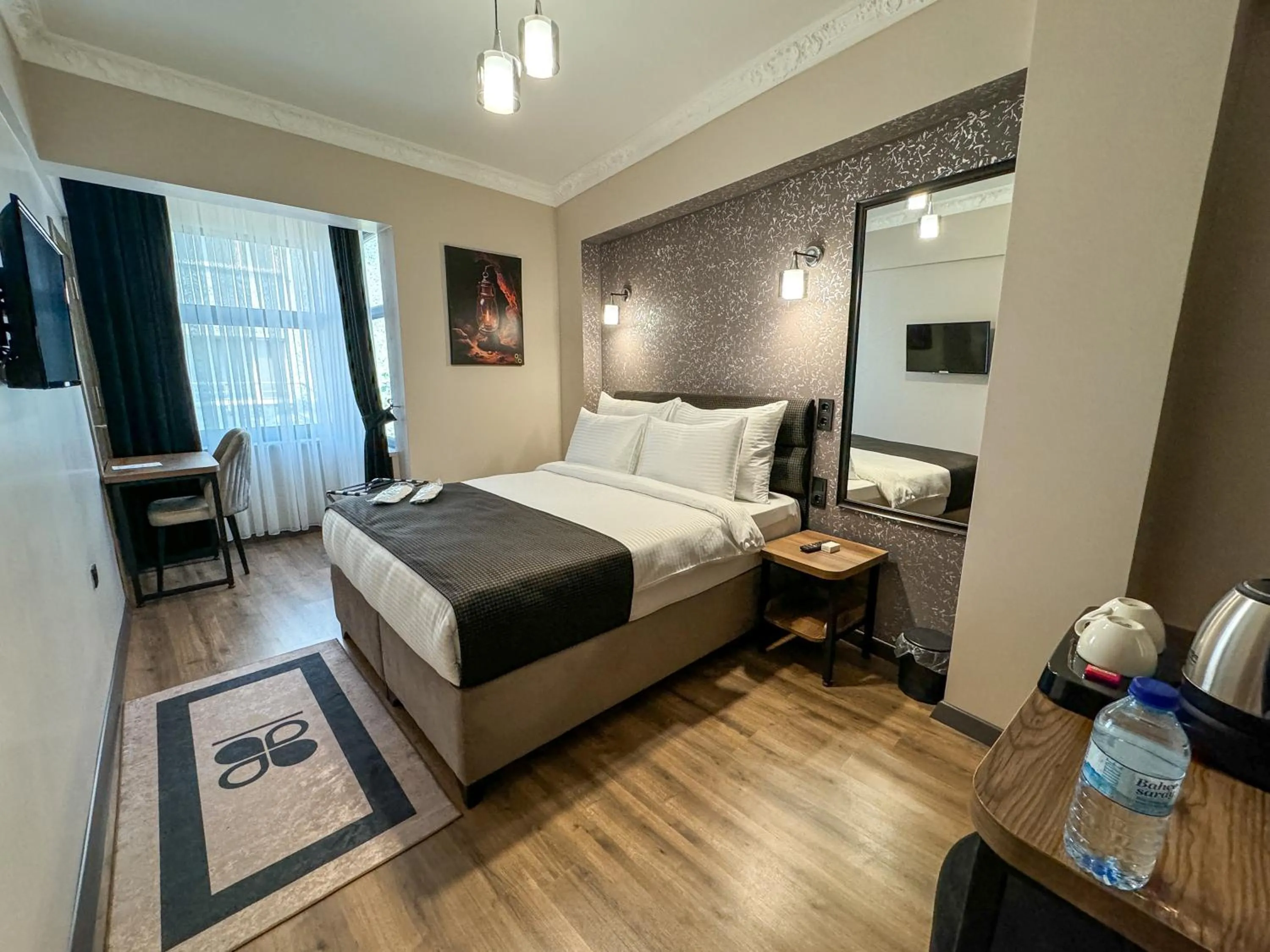 Bed in Grand CLOVER Hotel