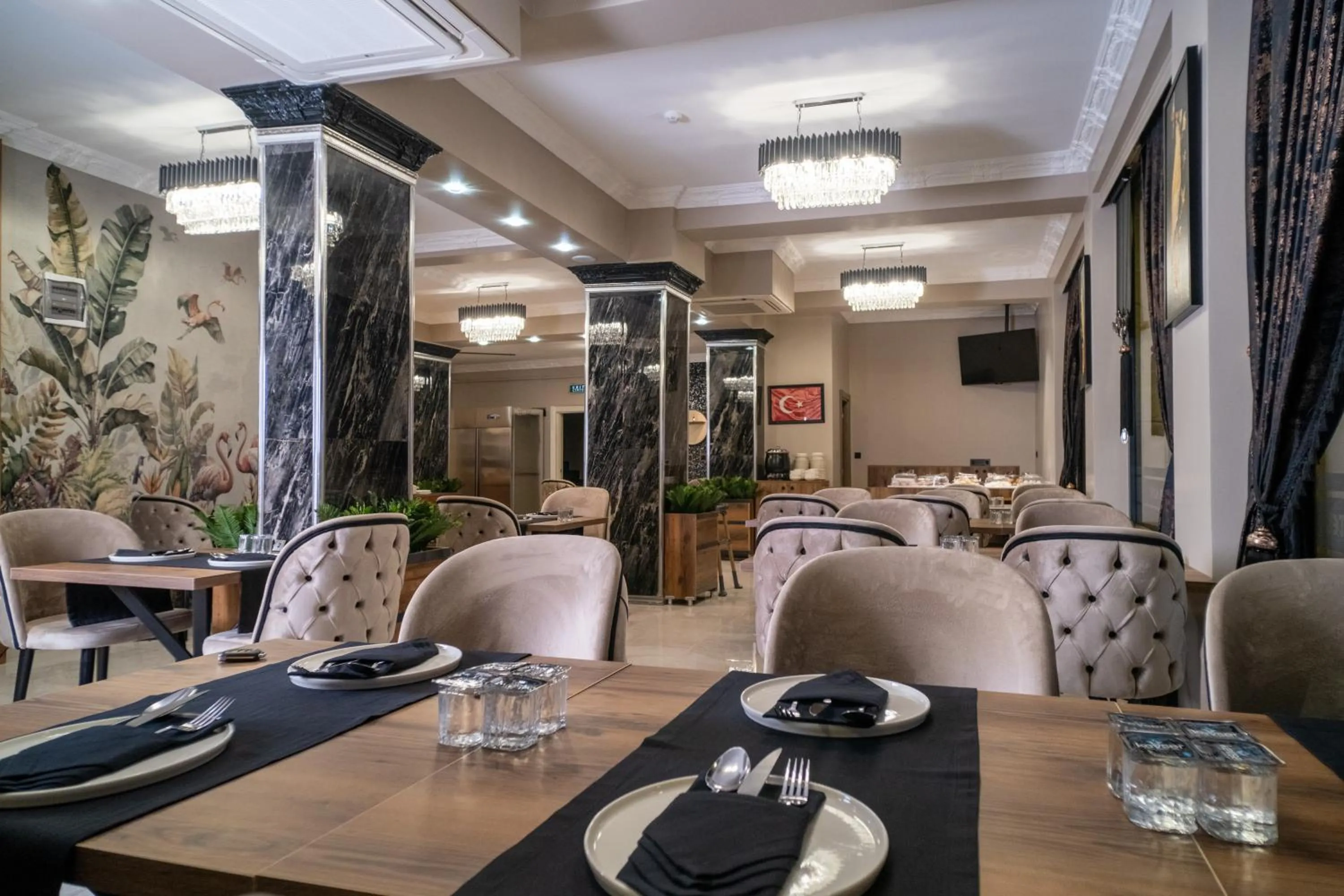 Communal lounge/ TV room in Grand CLOVER Hotel