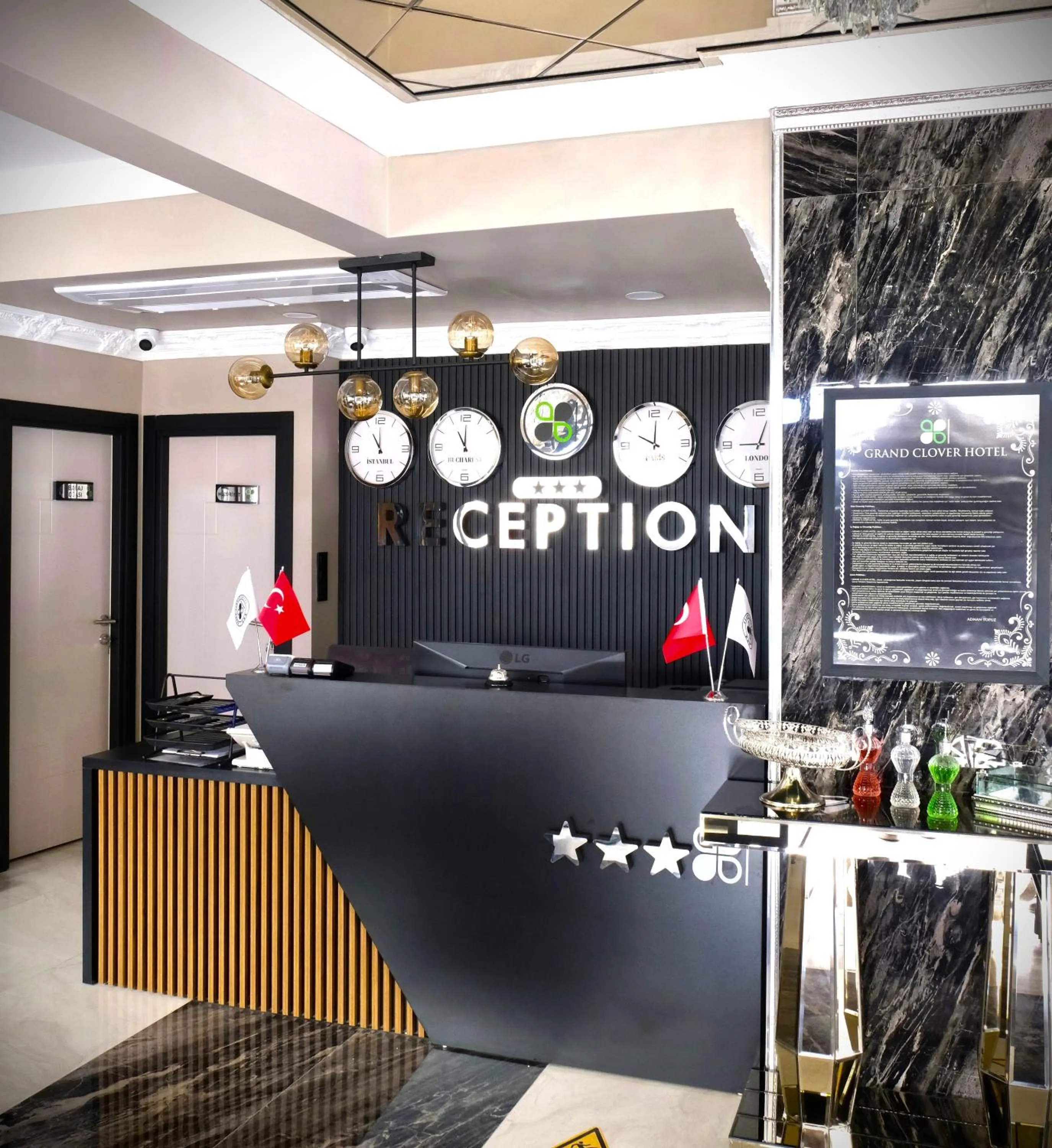 Communal lounge/ TV room in Grand CLOVER Hotel