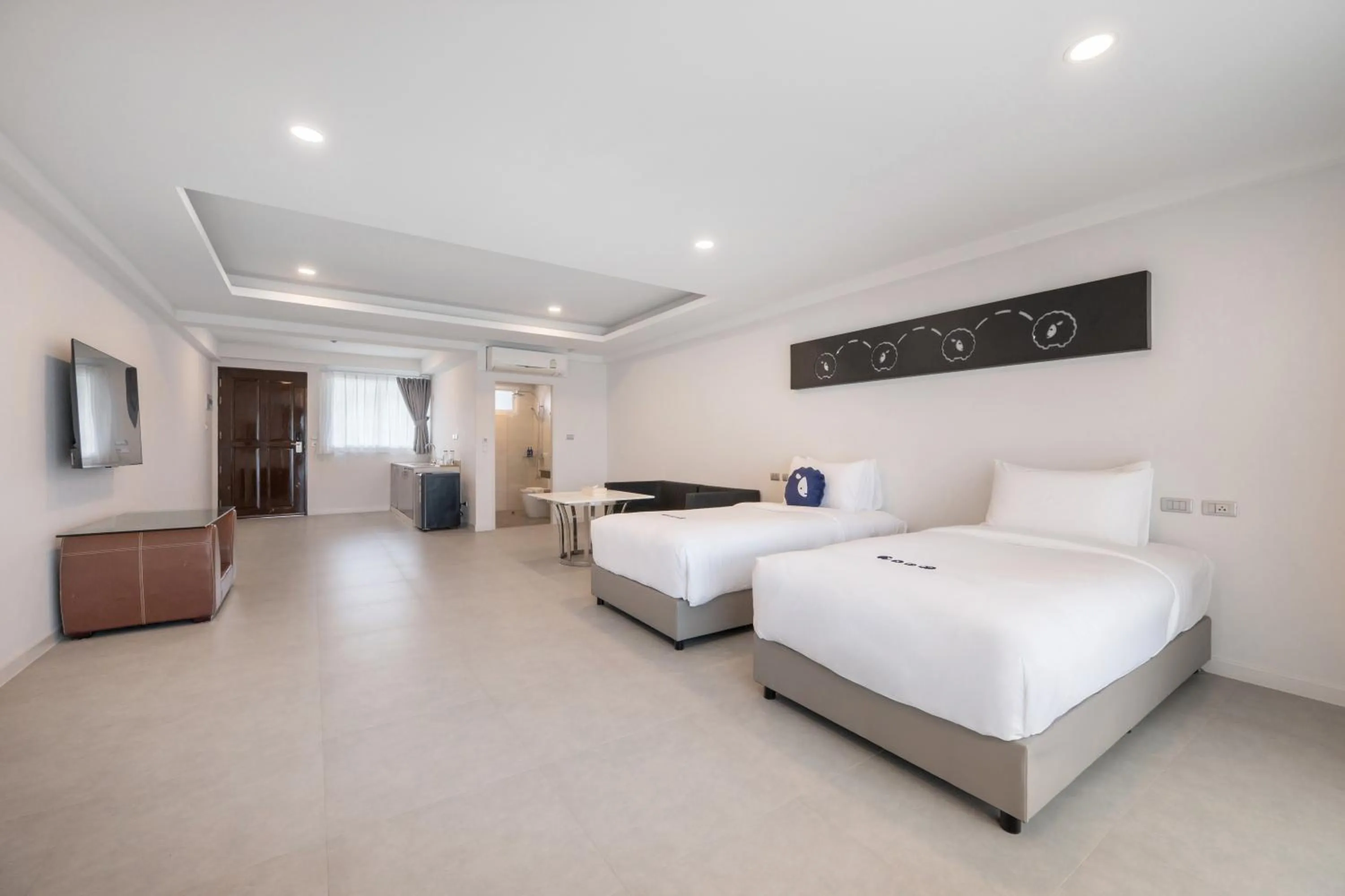 Bed in Kokotel Khao Lak Isara Casa