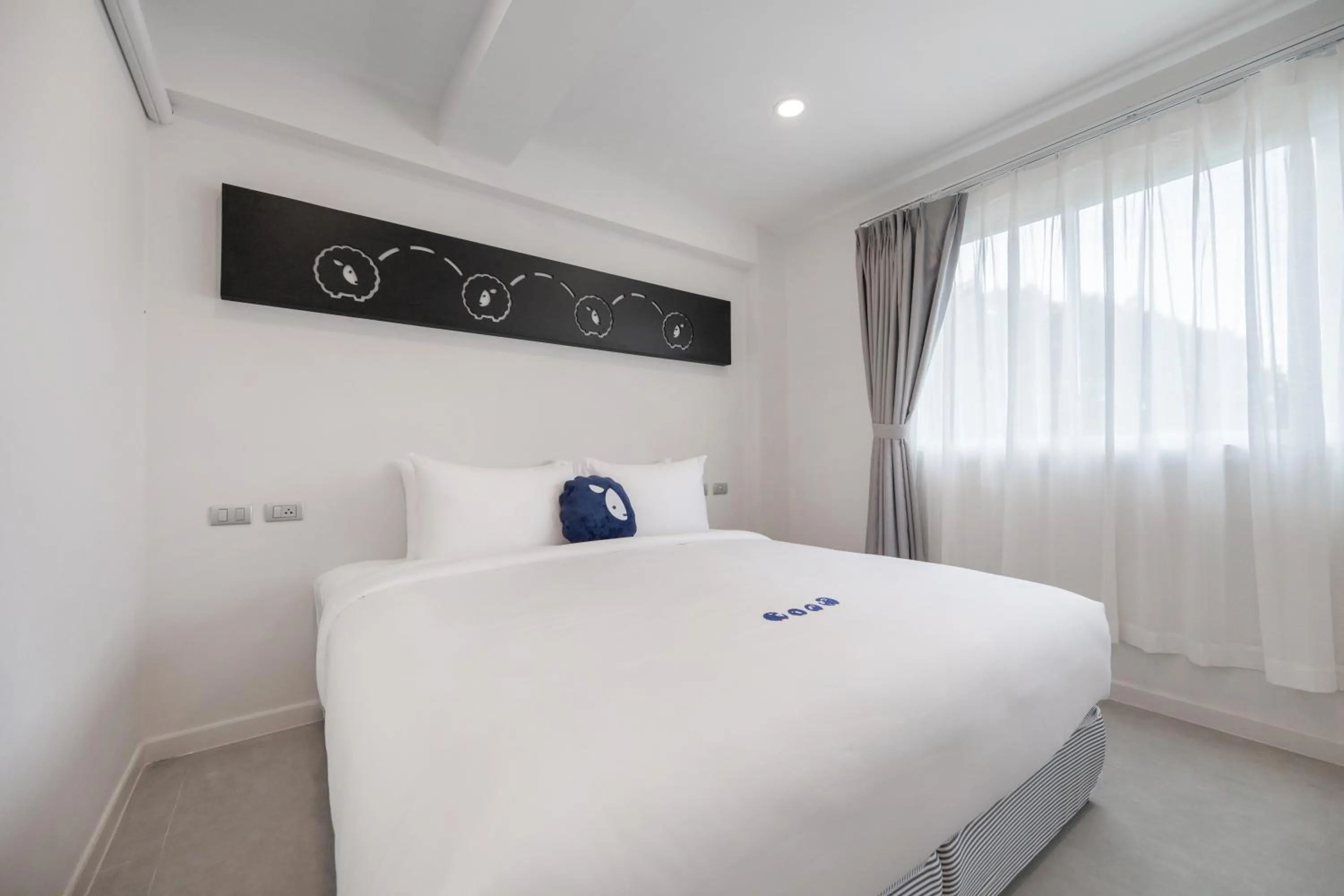 Bed in Kokotel Khao Lak Isara Casa