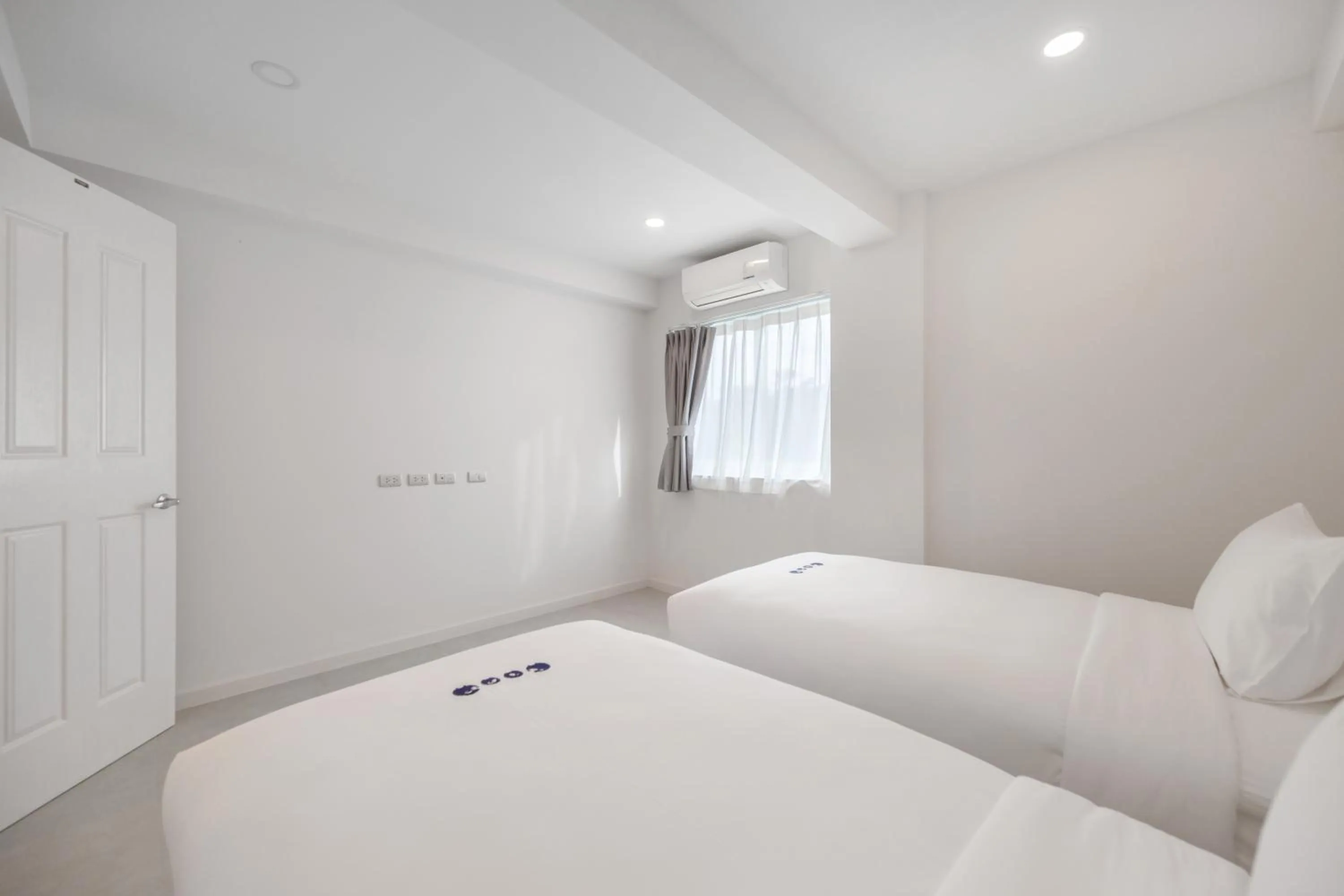 Bed in Kokotel Khao Lak Isara Casa