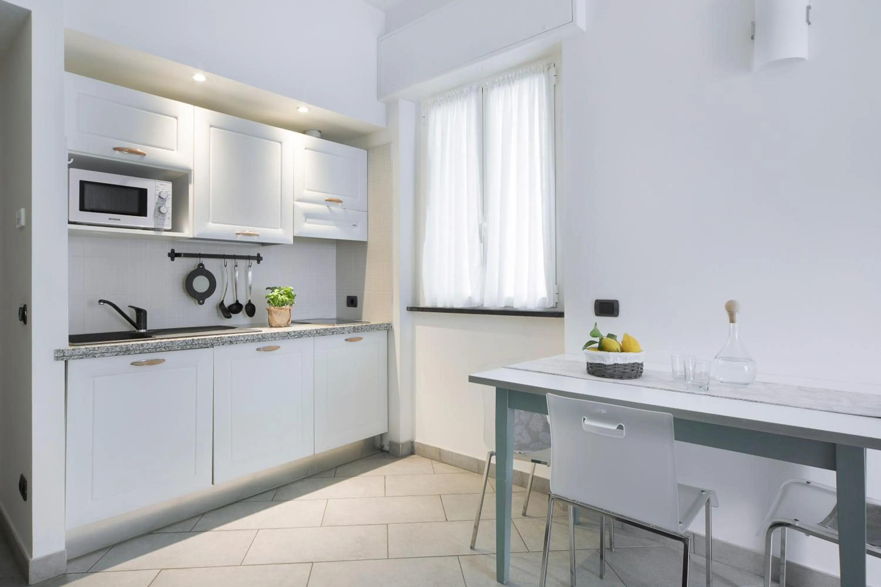 Kitchen or kitchenette in Hotel Residence Laigueglia free parking
