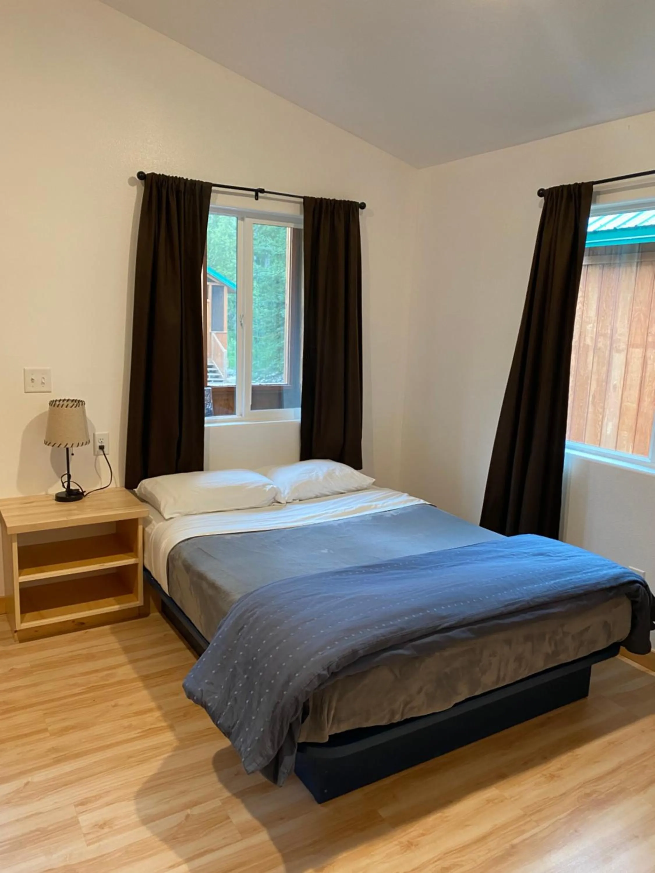 Bed in Talkeetna Wilderness Lodge & Cabin Rentals