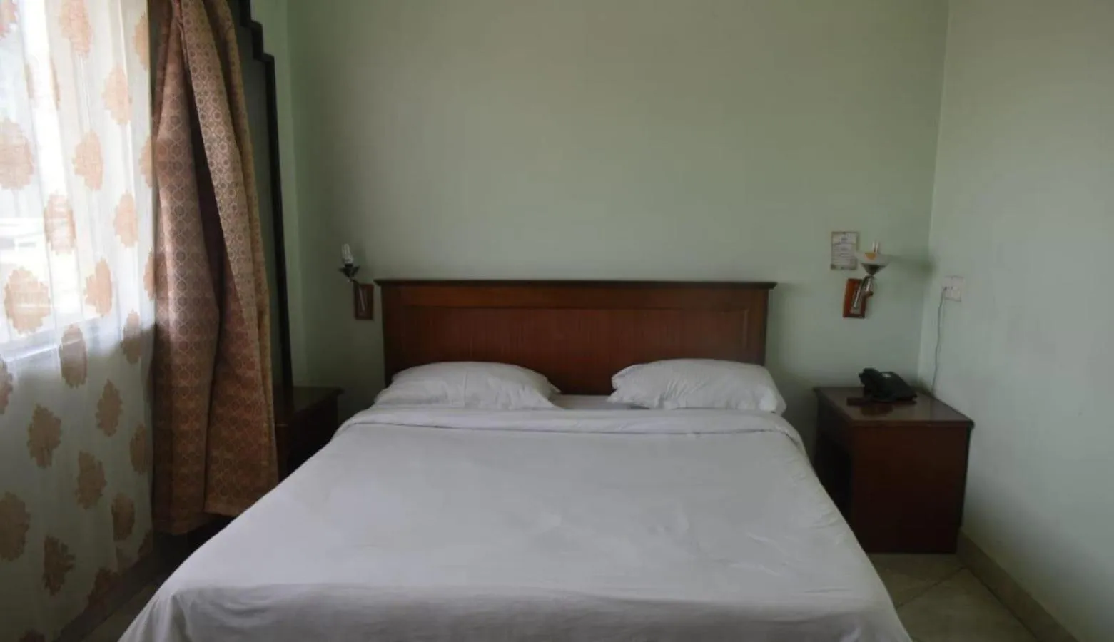 Bedroom in Sandton Palace Hotel