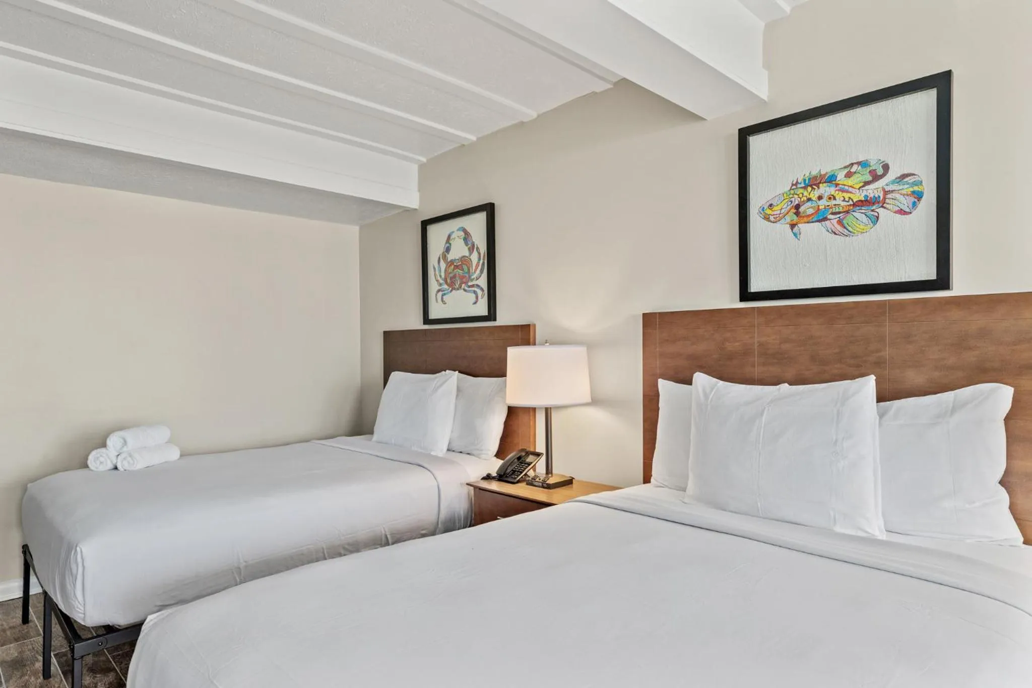 Bed in Sandpiper Beacon Beach Resort