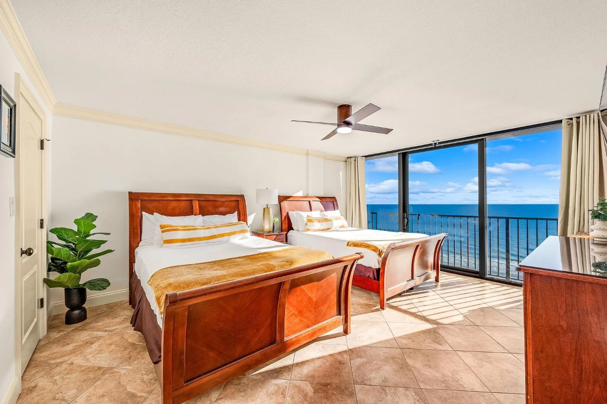 Bed in Sandpiper Beacon Beach Resort