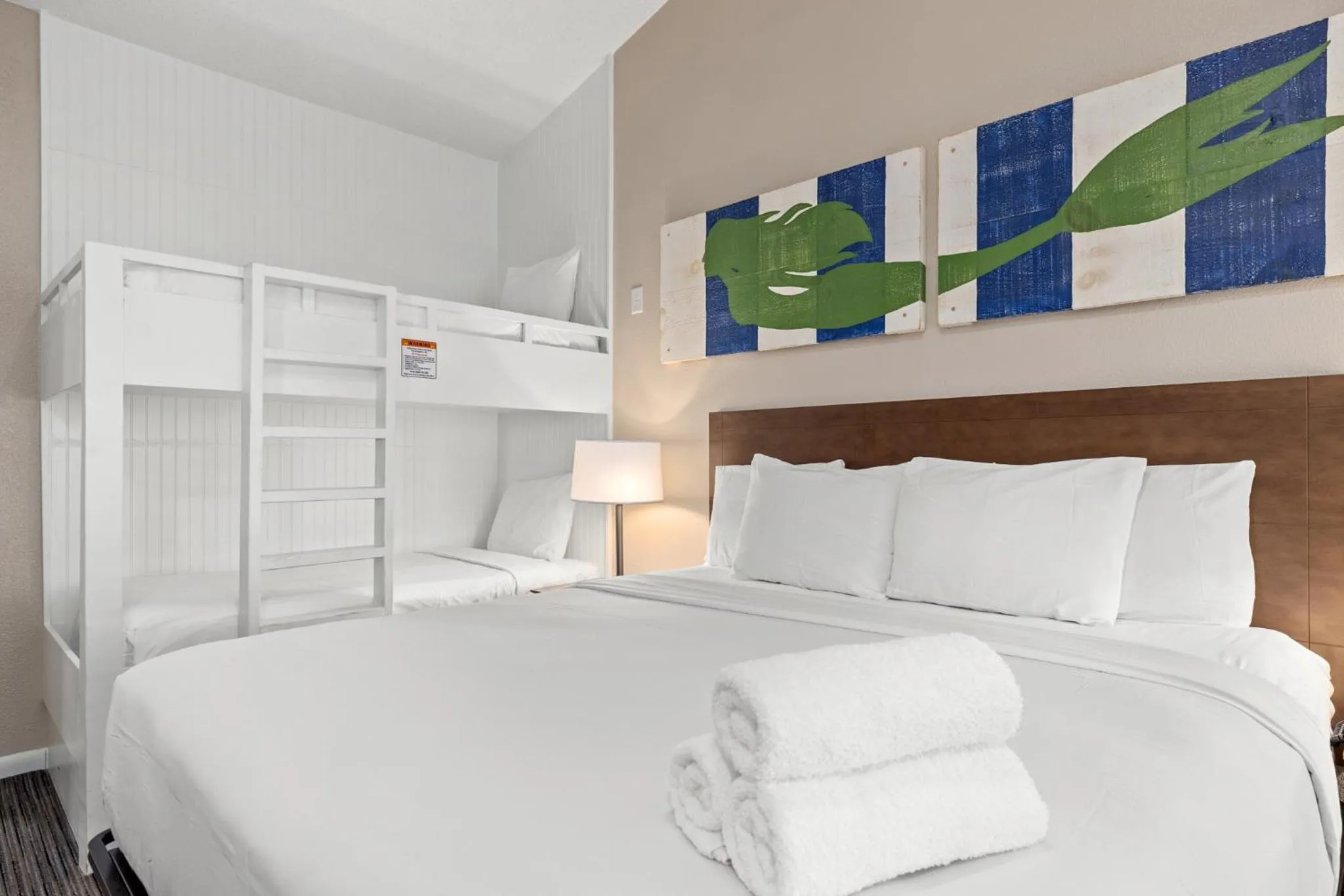 Bed in Sandpiper Beacon Beach Resort