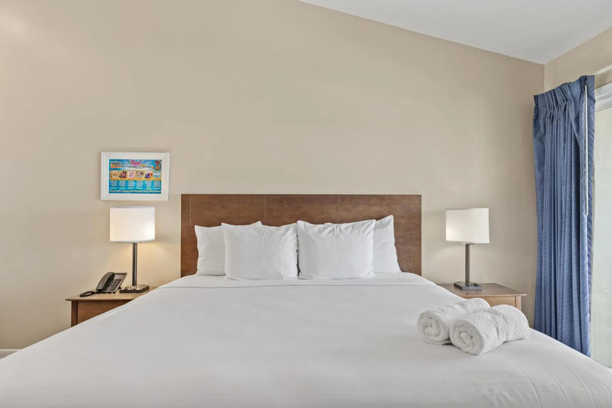 Bed in Sandpiper Beacon Beach Resort