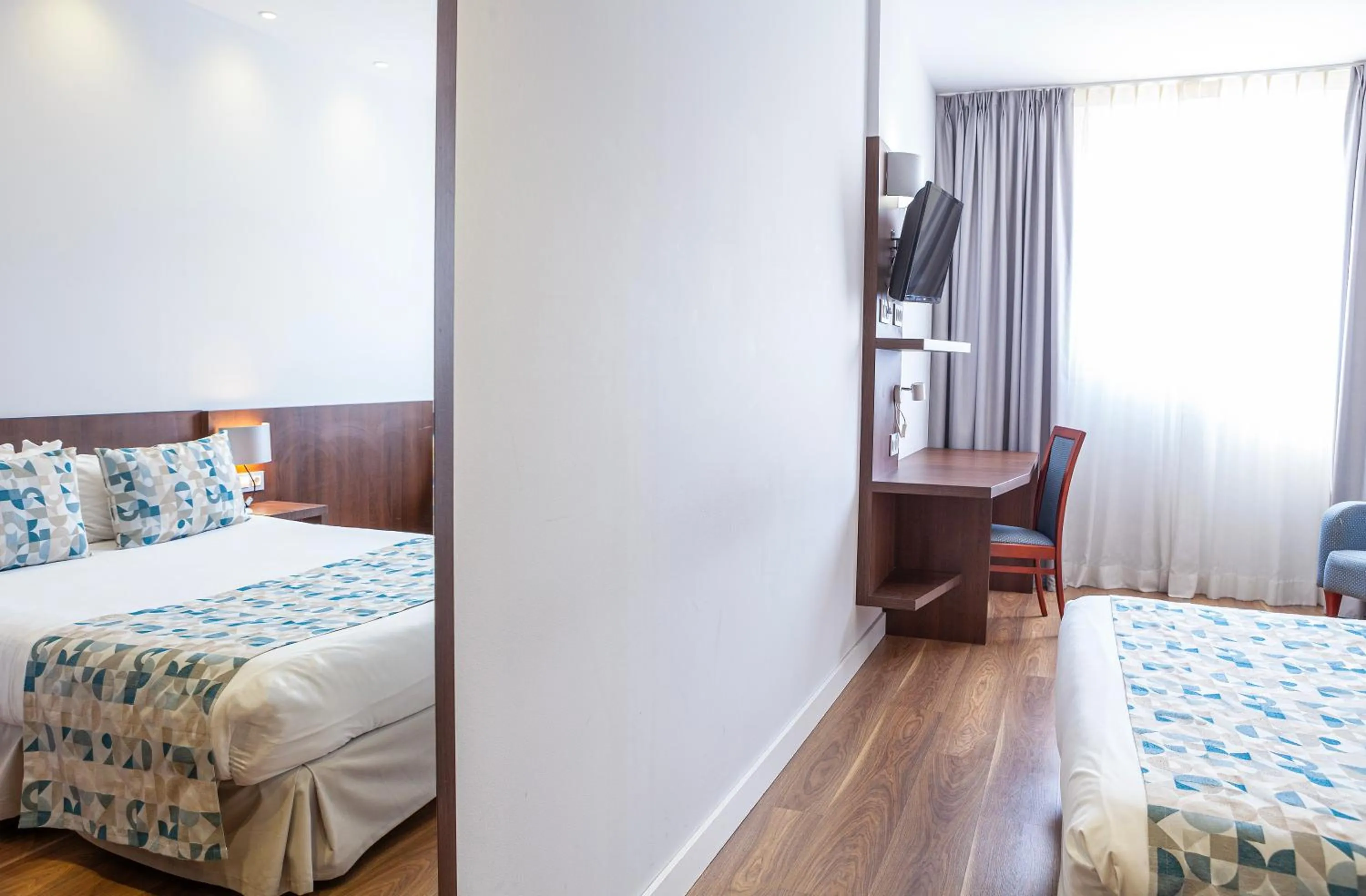 Decorative detail, Bed in Hotel Olympia Universidades