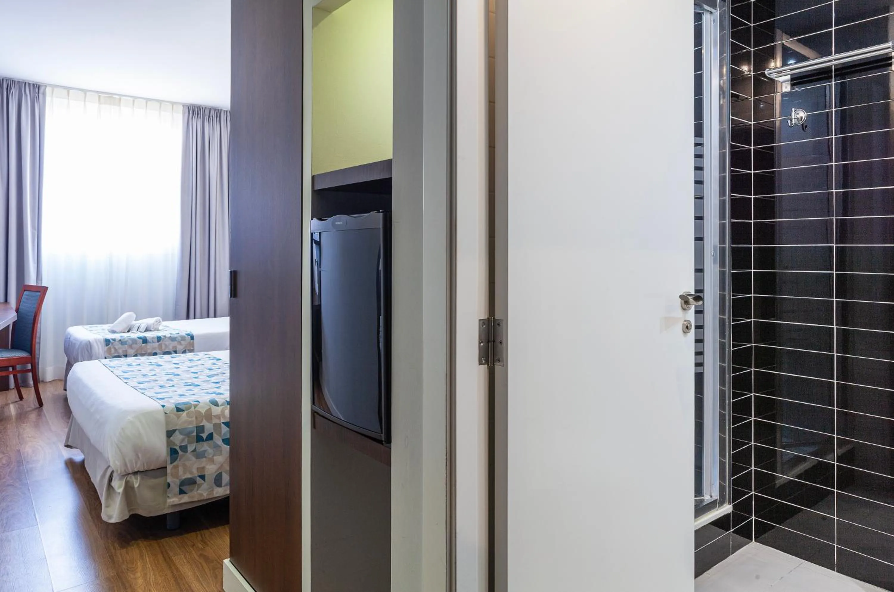 Decorative detail, Bed in Hotel Olympia Universidades