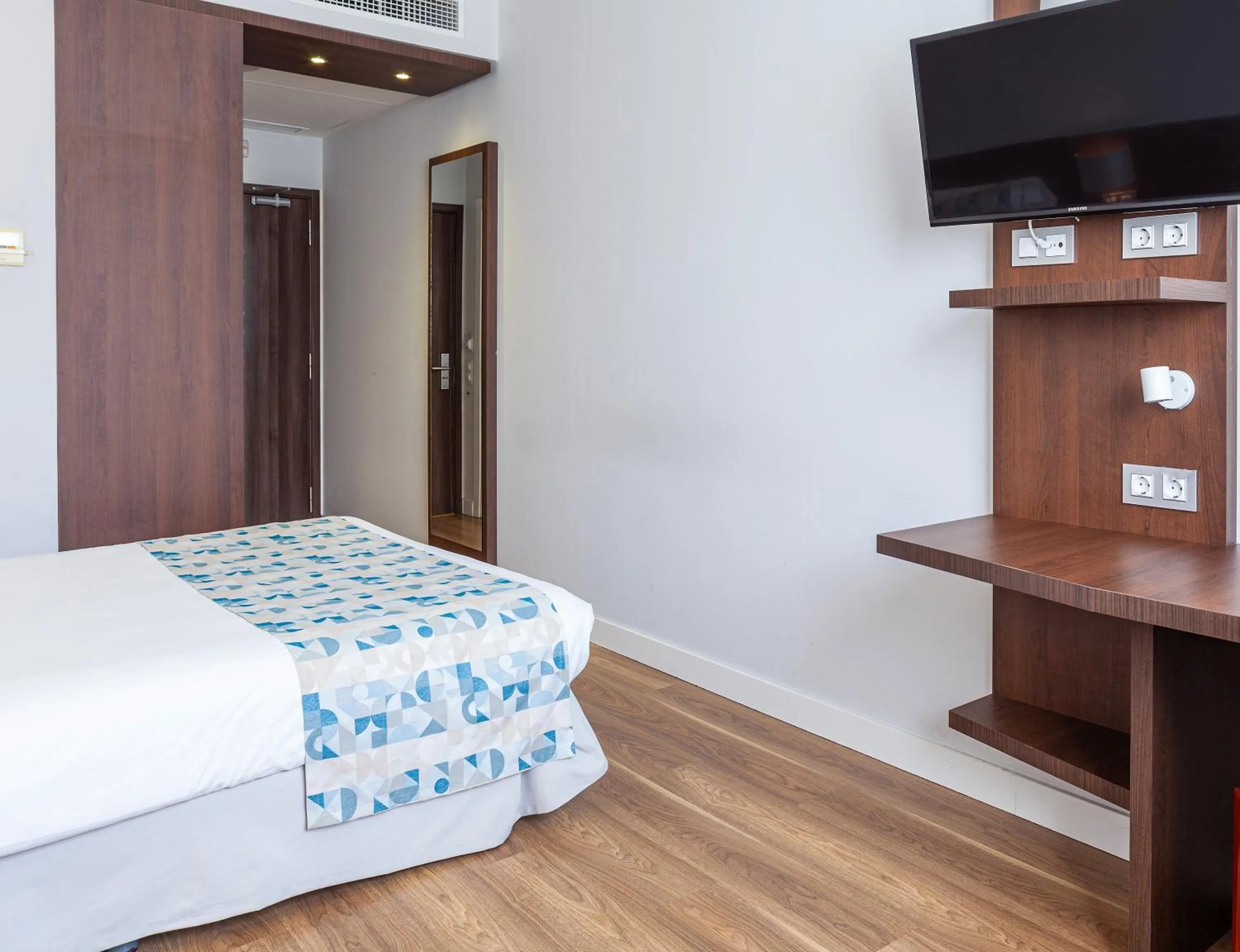 Bed in Hotel Olympia Universidades