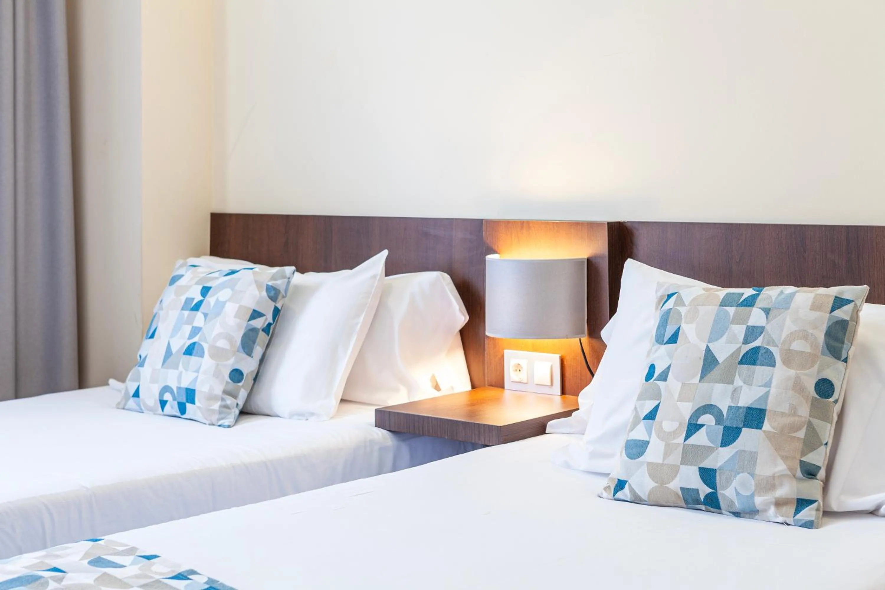 Decorative detail, Bed in Hotel Olympia Universidades