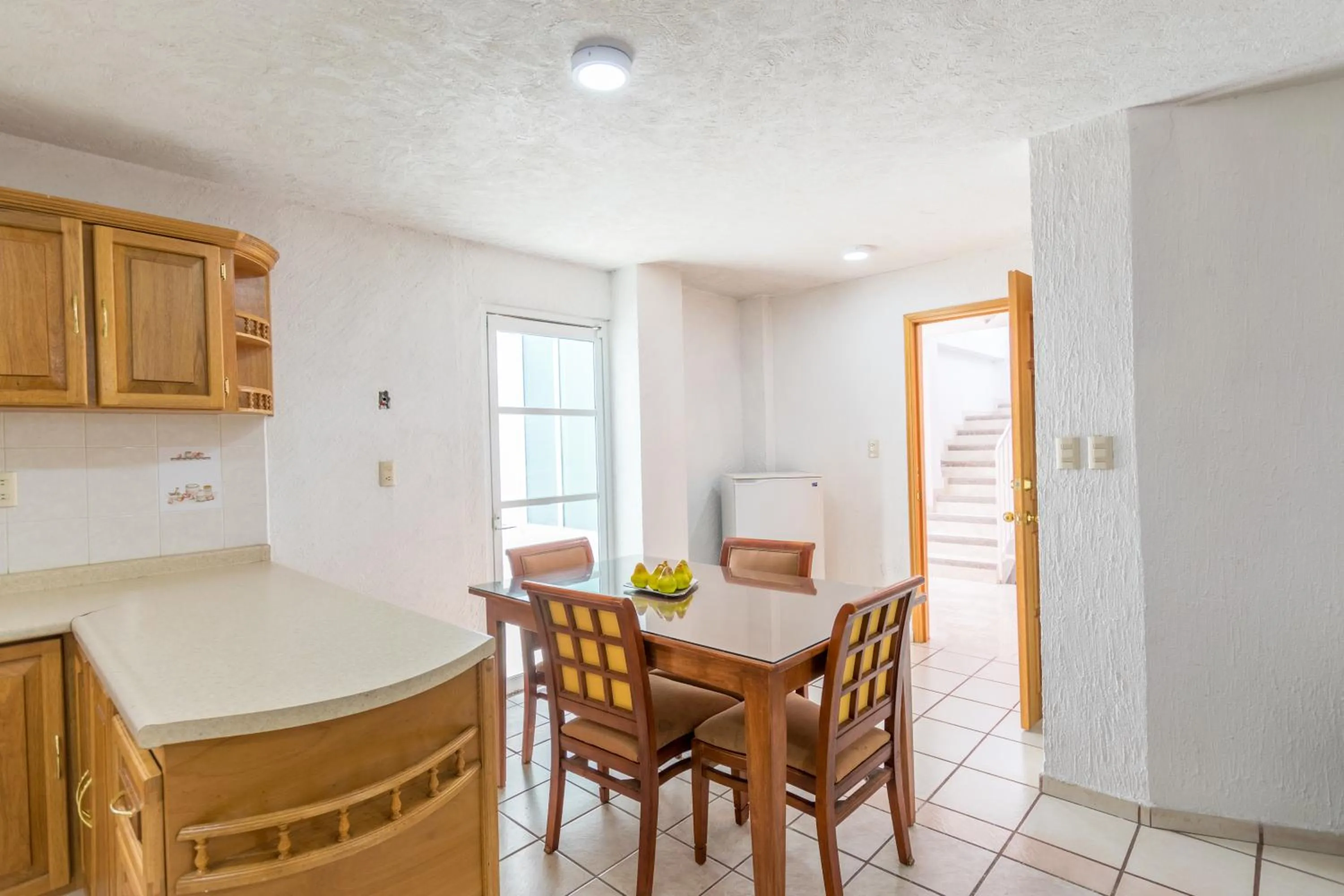 Dining area in Suites Poliforum Inn