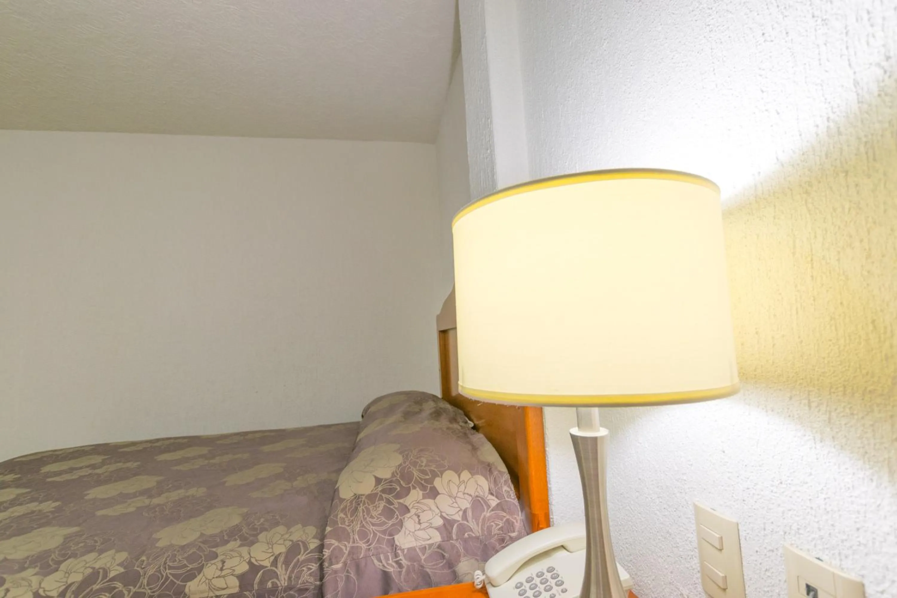 Bed in Suites Poliforum Inn