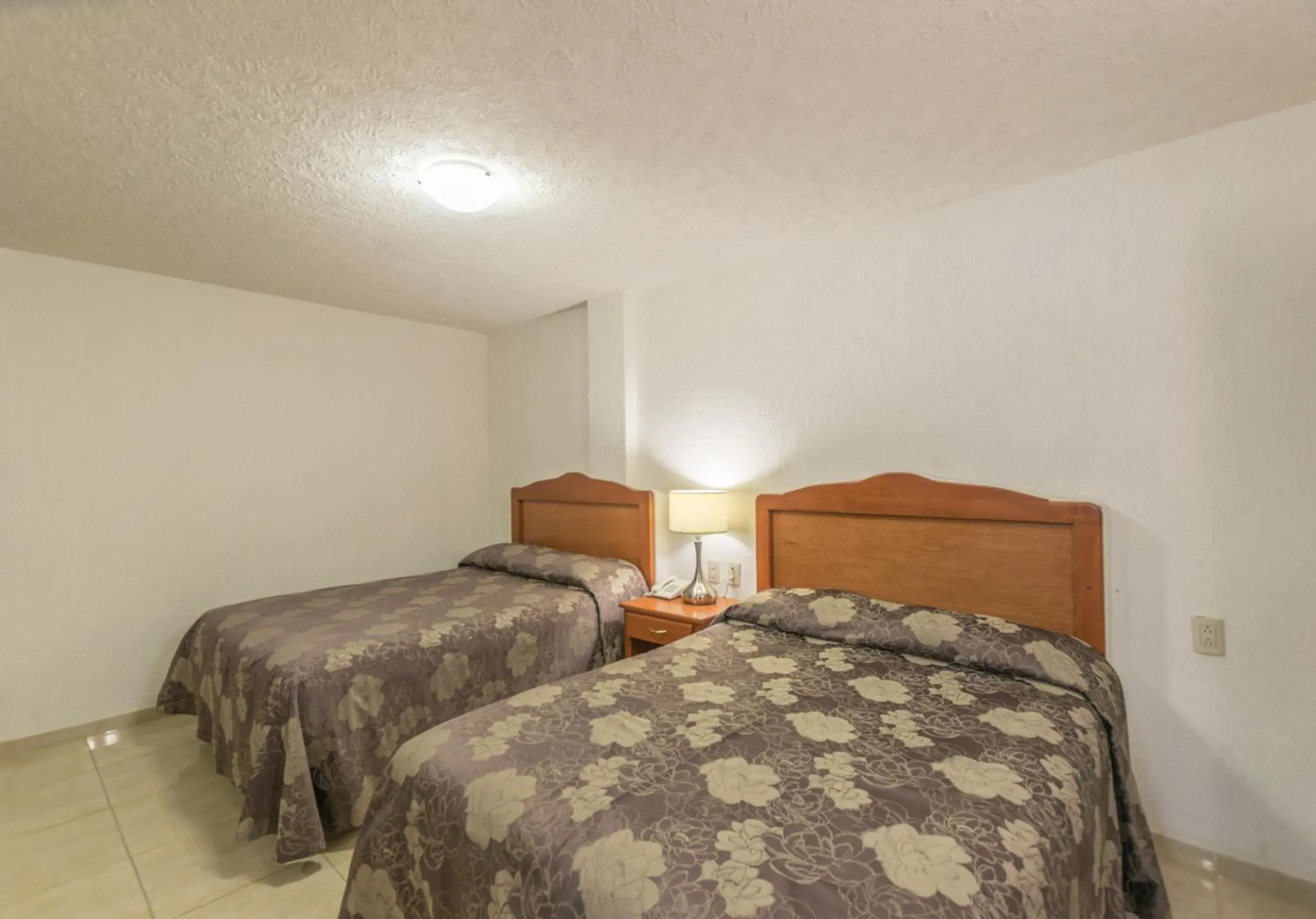 Double Room with Two Double Beds in Suites Poliforum Inn Double Room with Two Double Beds in Suites Poliforum Inn