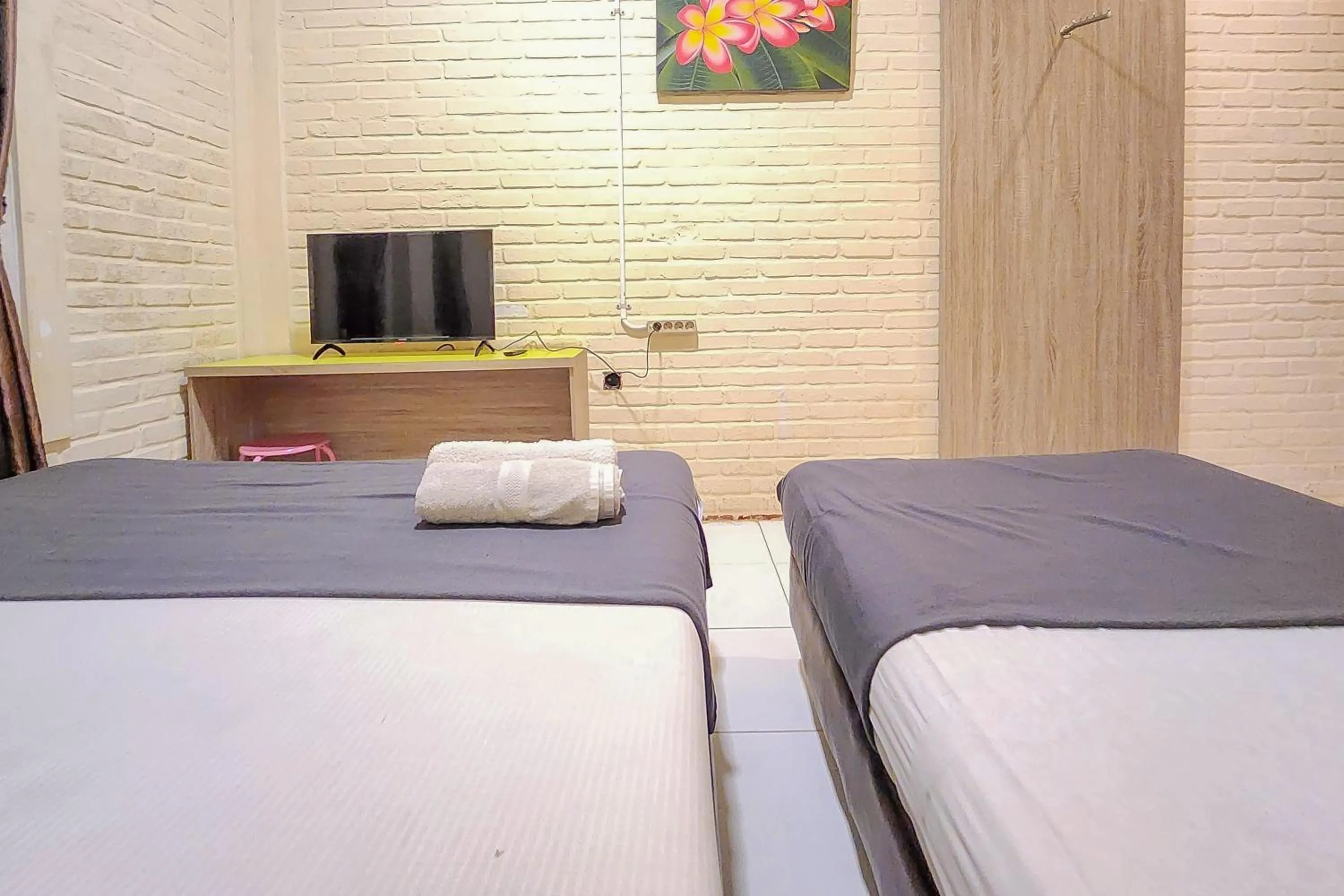 Bedroom, Bed in Urbanview Hotel Star Residence Puncak
