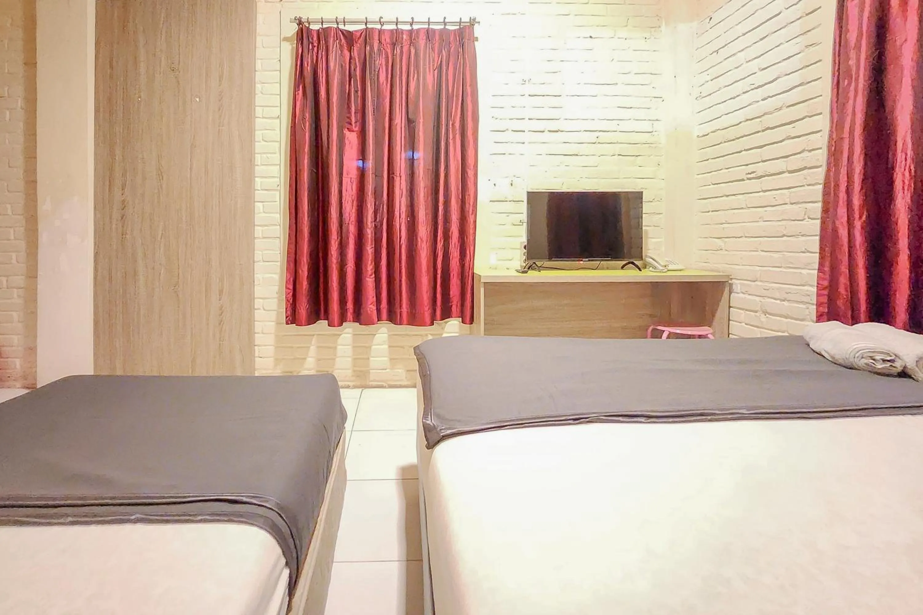 Bedroom, Bed in Urbanview Hotel Star Residence Puncak