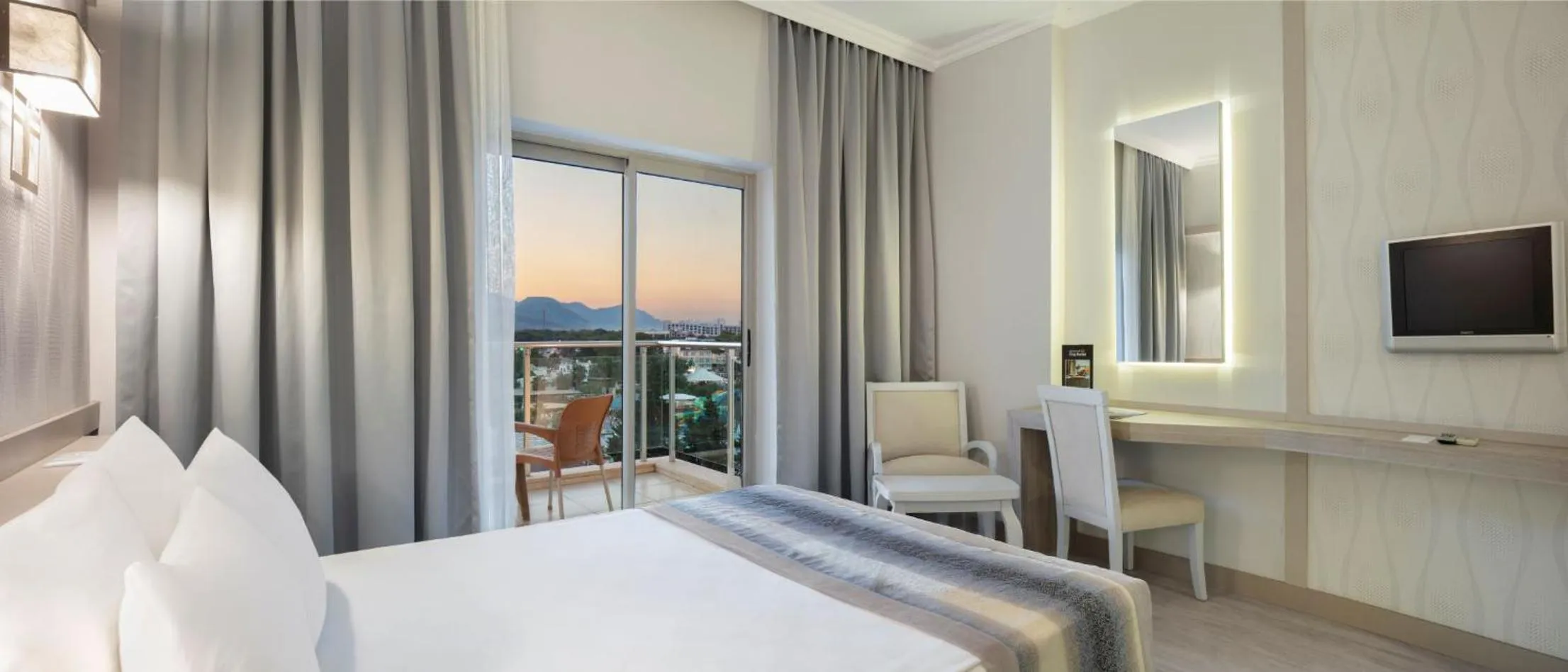 Bed in Grand Ring Hotel