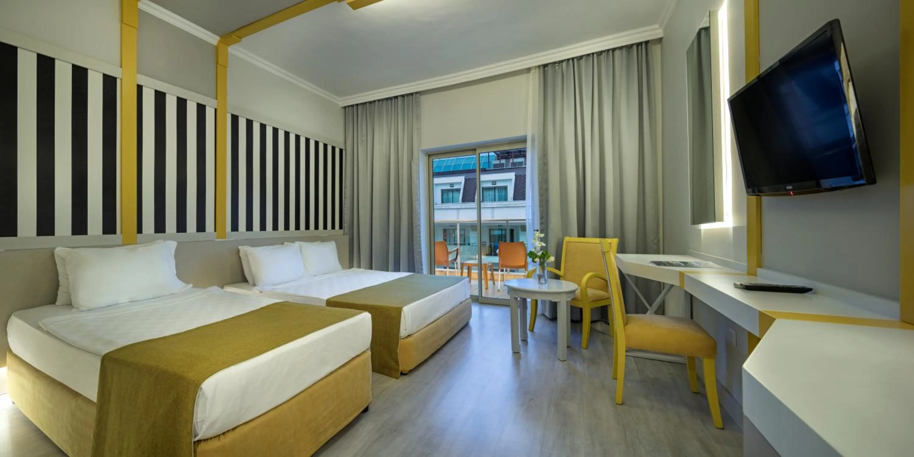 Bed in Grand Ring Hotel