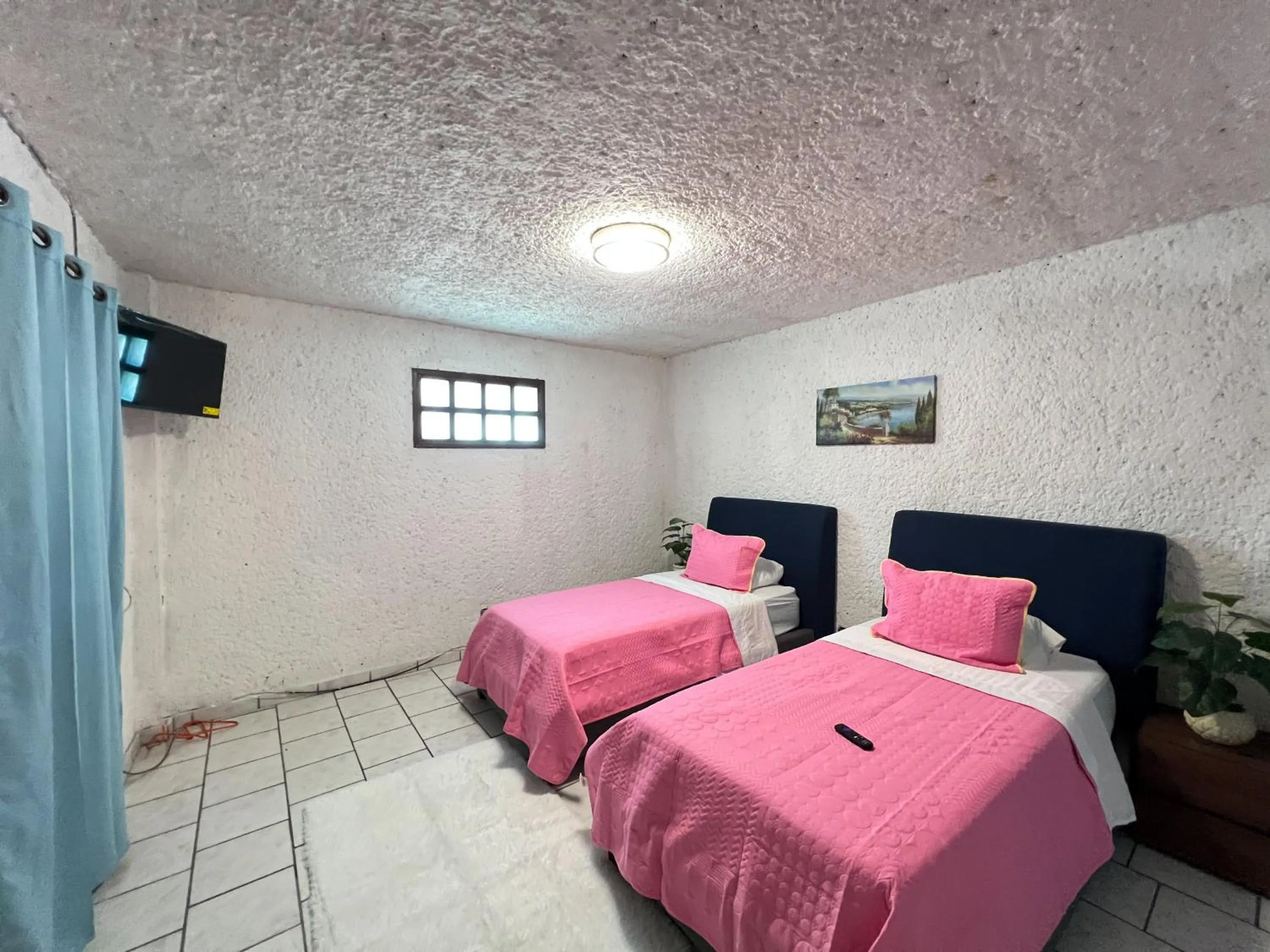 Bed in Hotel RJ Querétaro