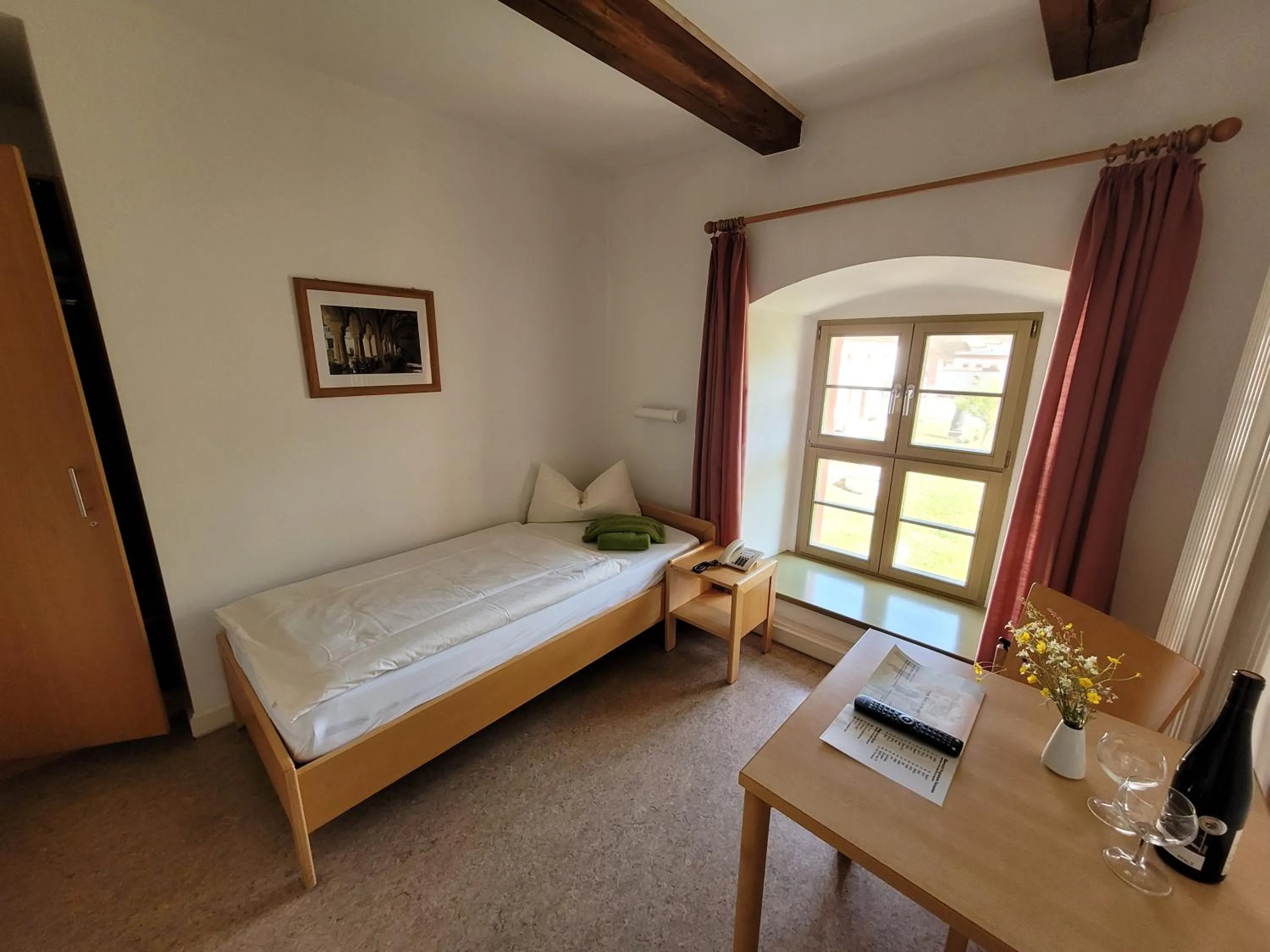 Photo of the whole room, Bed in Gästehäuser St. Marienthal