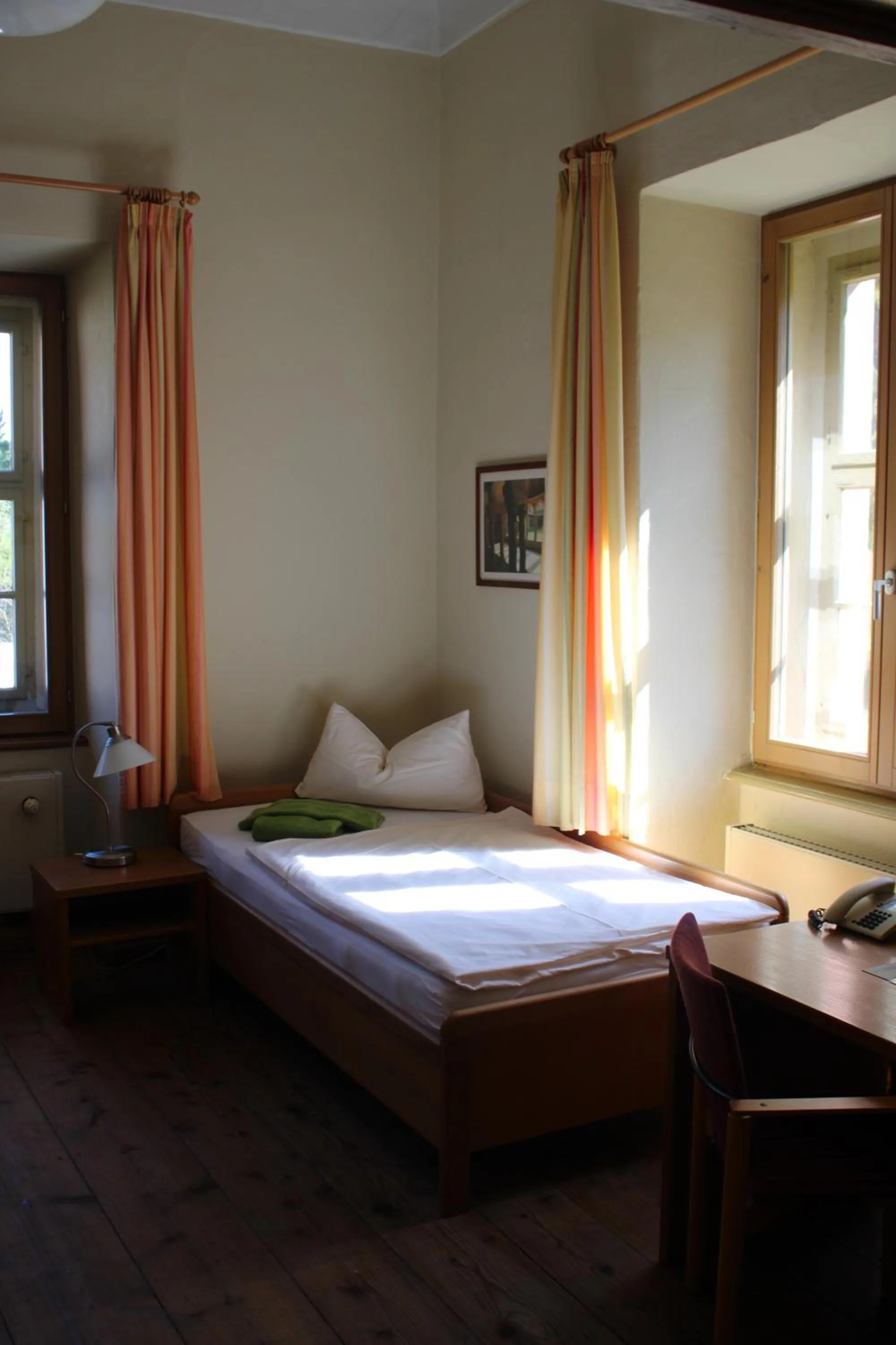 Photo of the whole room, Bed in Gästehäuser St. Marienthal