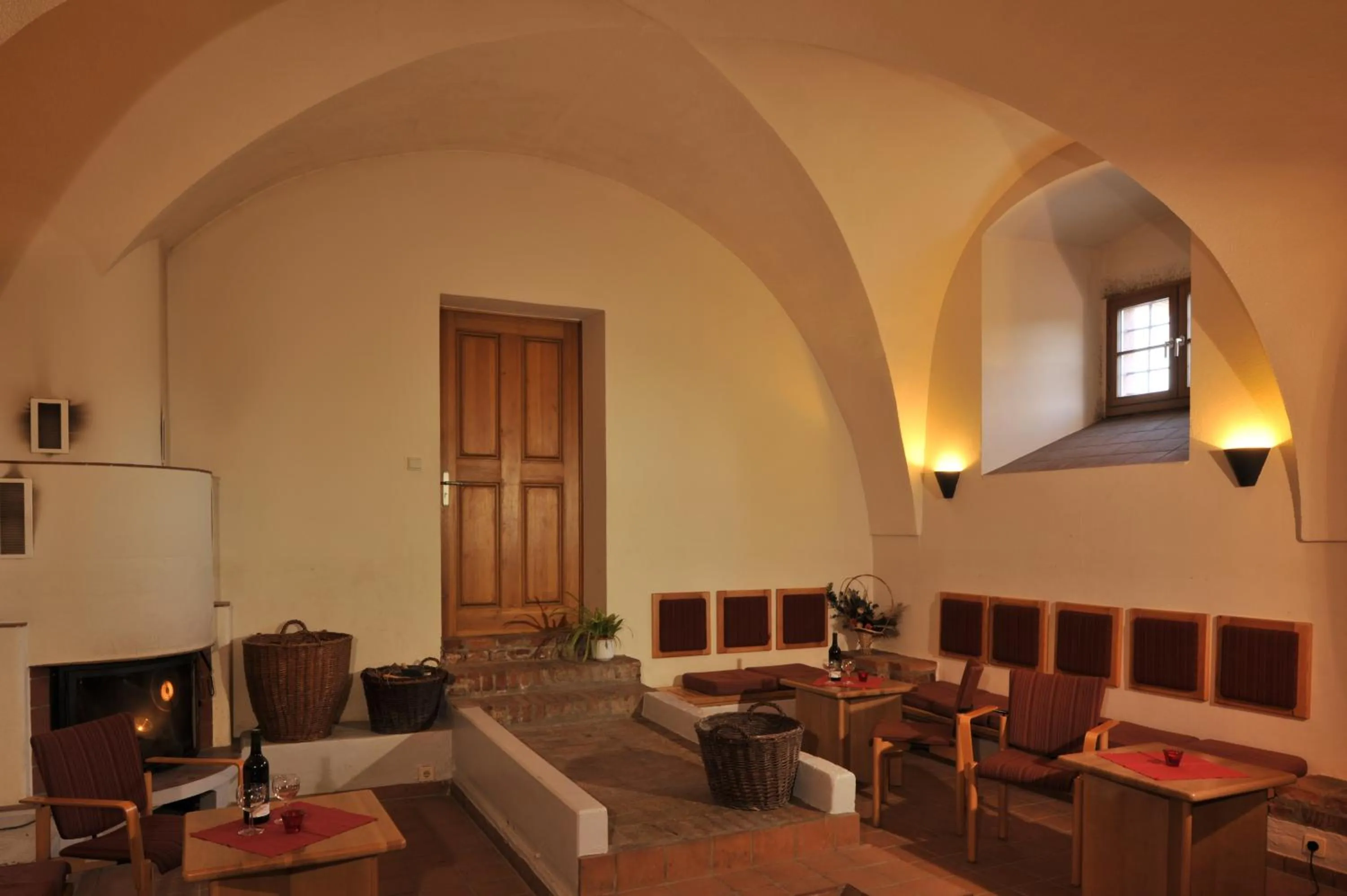 Communal lounge/ TV room in Gästehäuser St. Marienthal