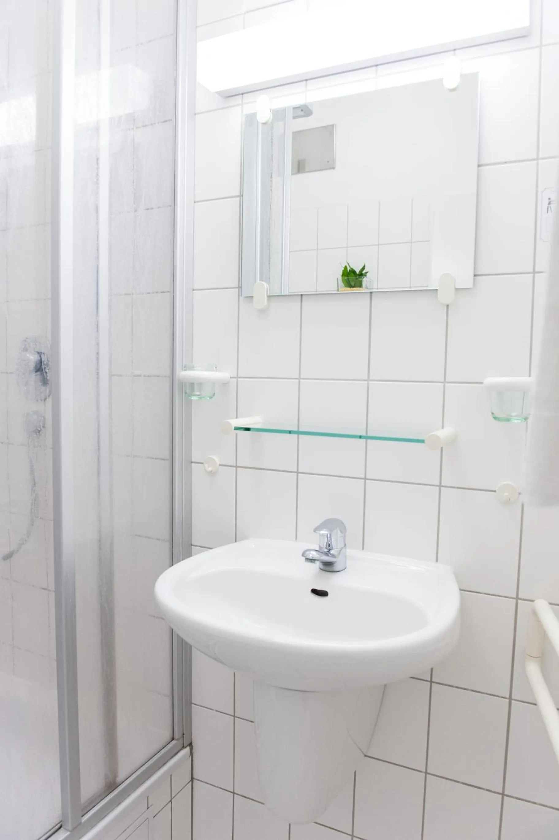 Bathroom in Gästehäuser St. Marienthal