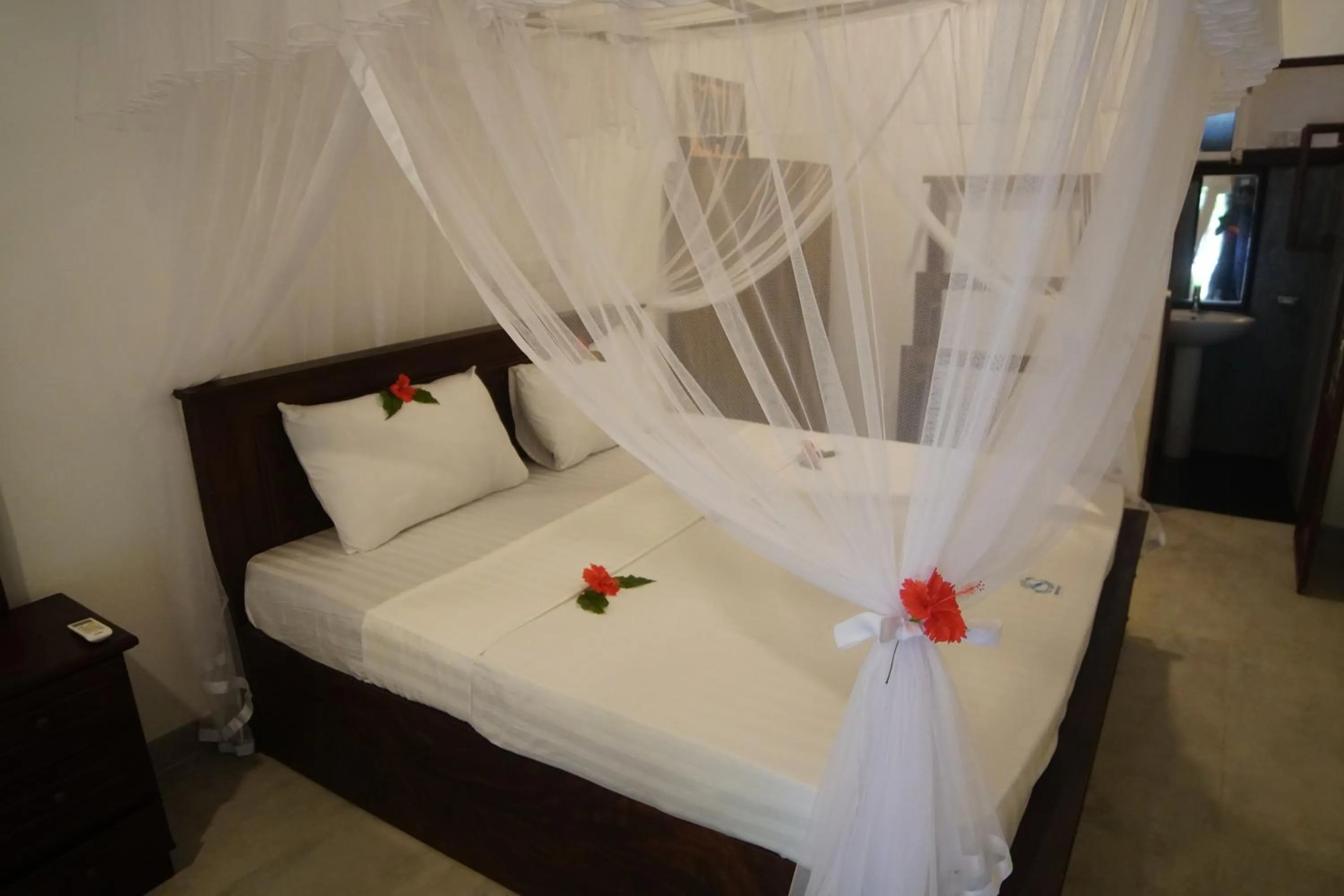 Bed in Turtle Bay Beach Resort