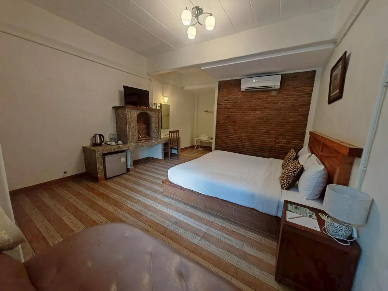 Bed in Kenikar Raintree Residence Hotel